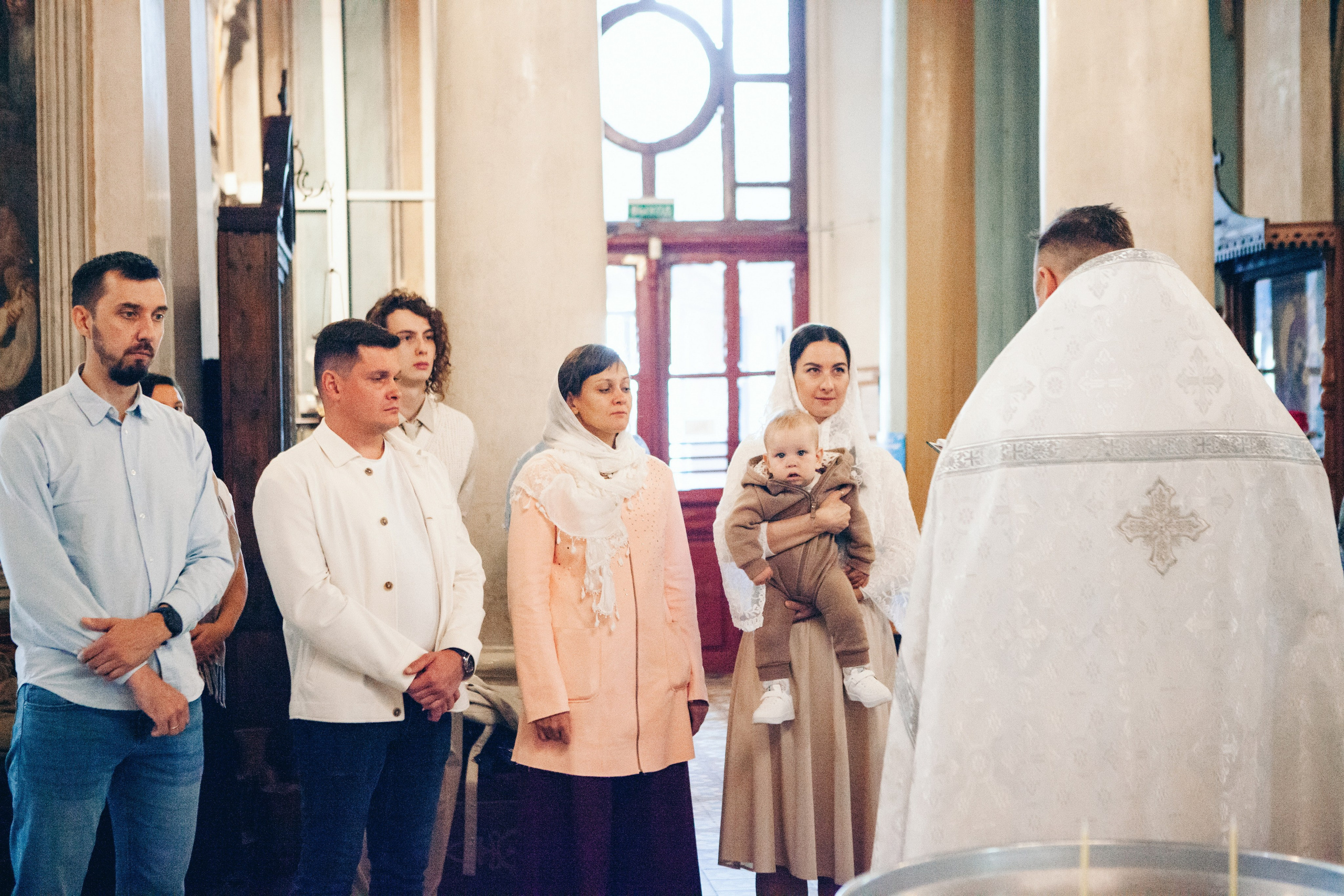 Крещение ребенка в церкви. Фотограф Ольга Ефремова