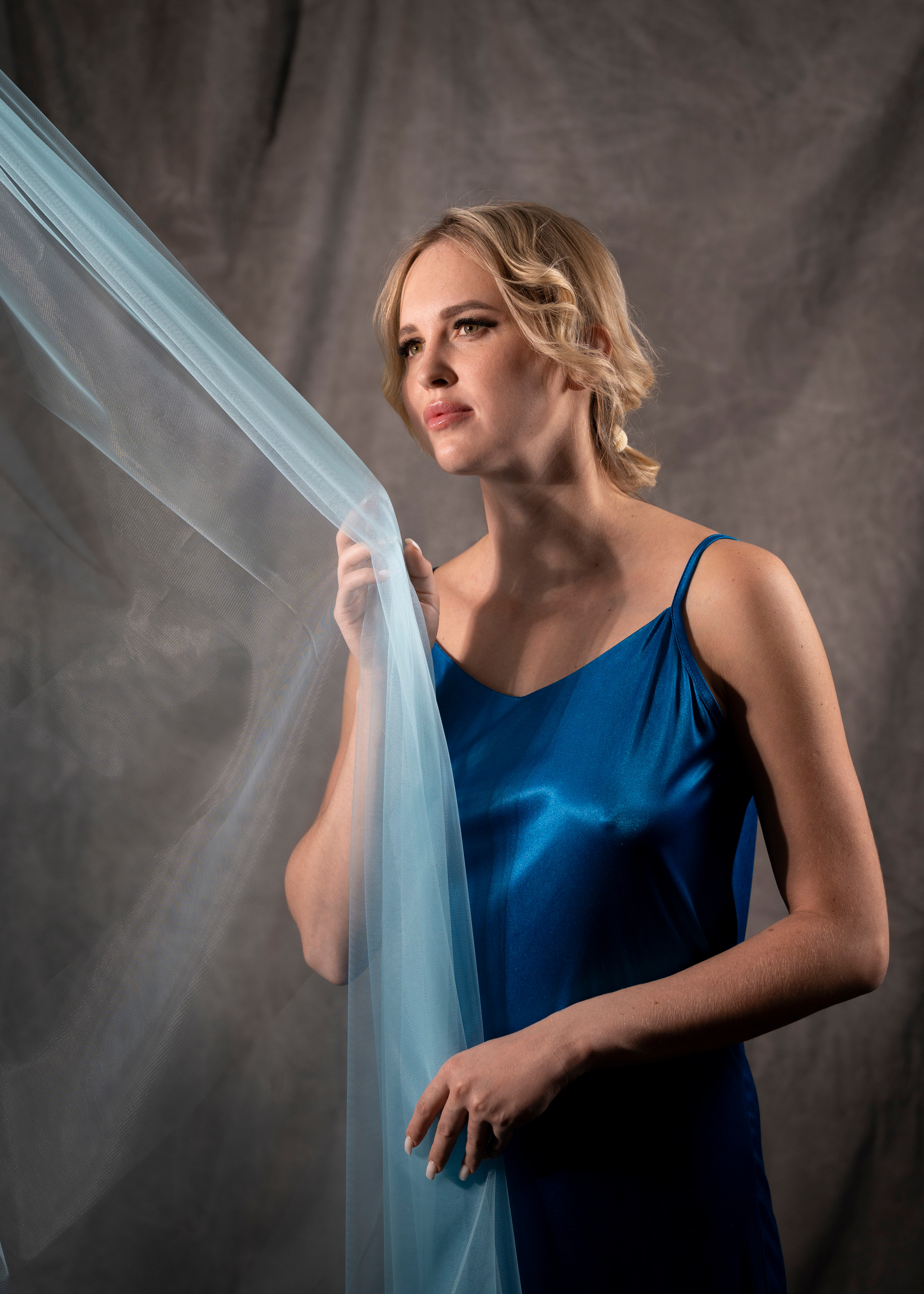 Портретная съёмка (фотосессия) девушки с воздушной тюлью