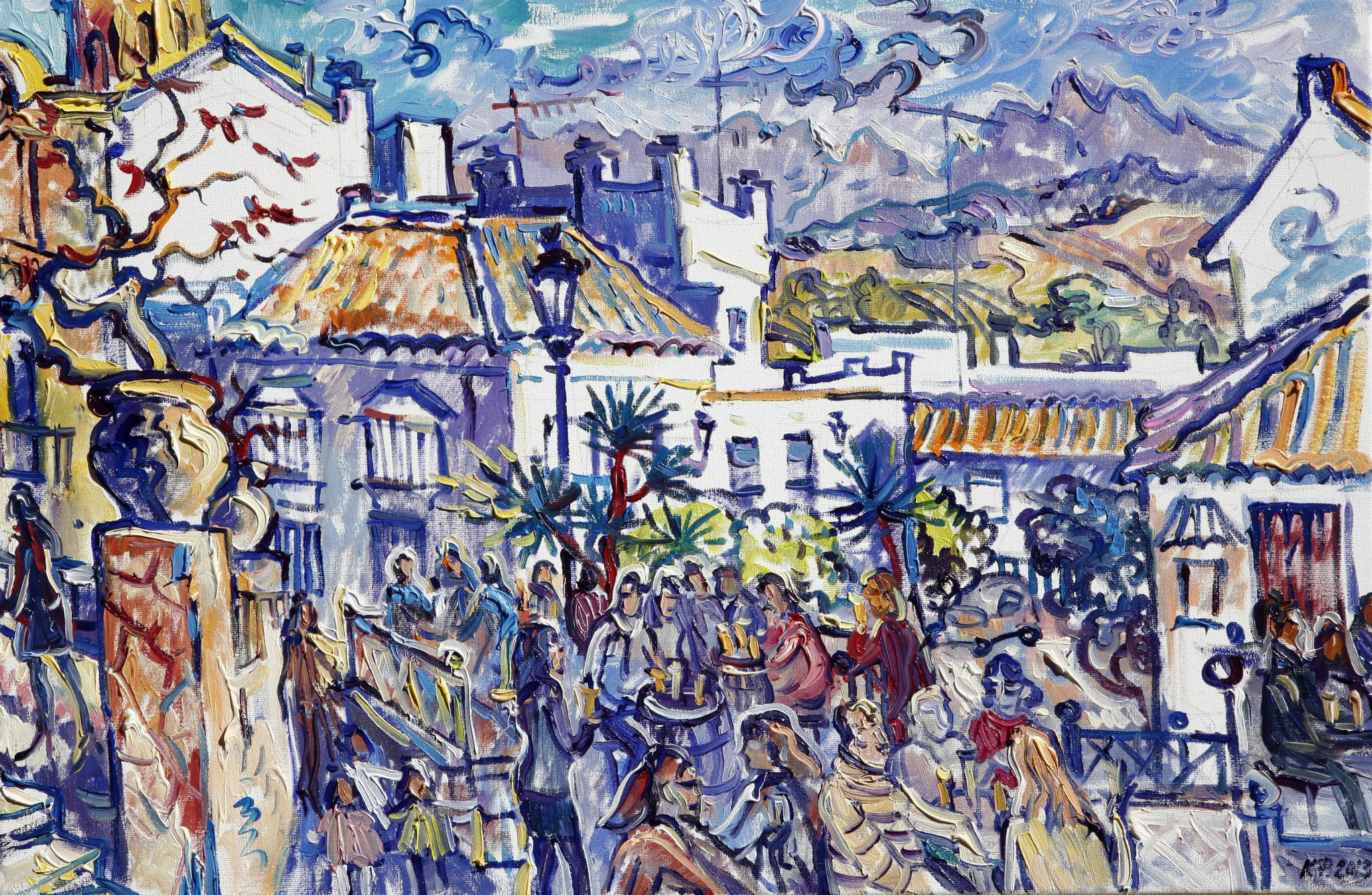 Landscape view of the square with a bar and mountains in the distance. La Taverna Red House Bar. Espera.