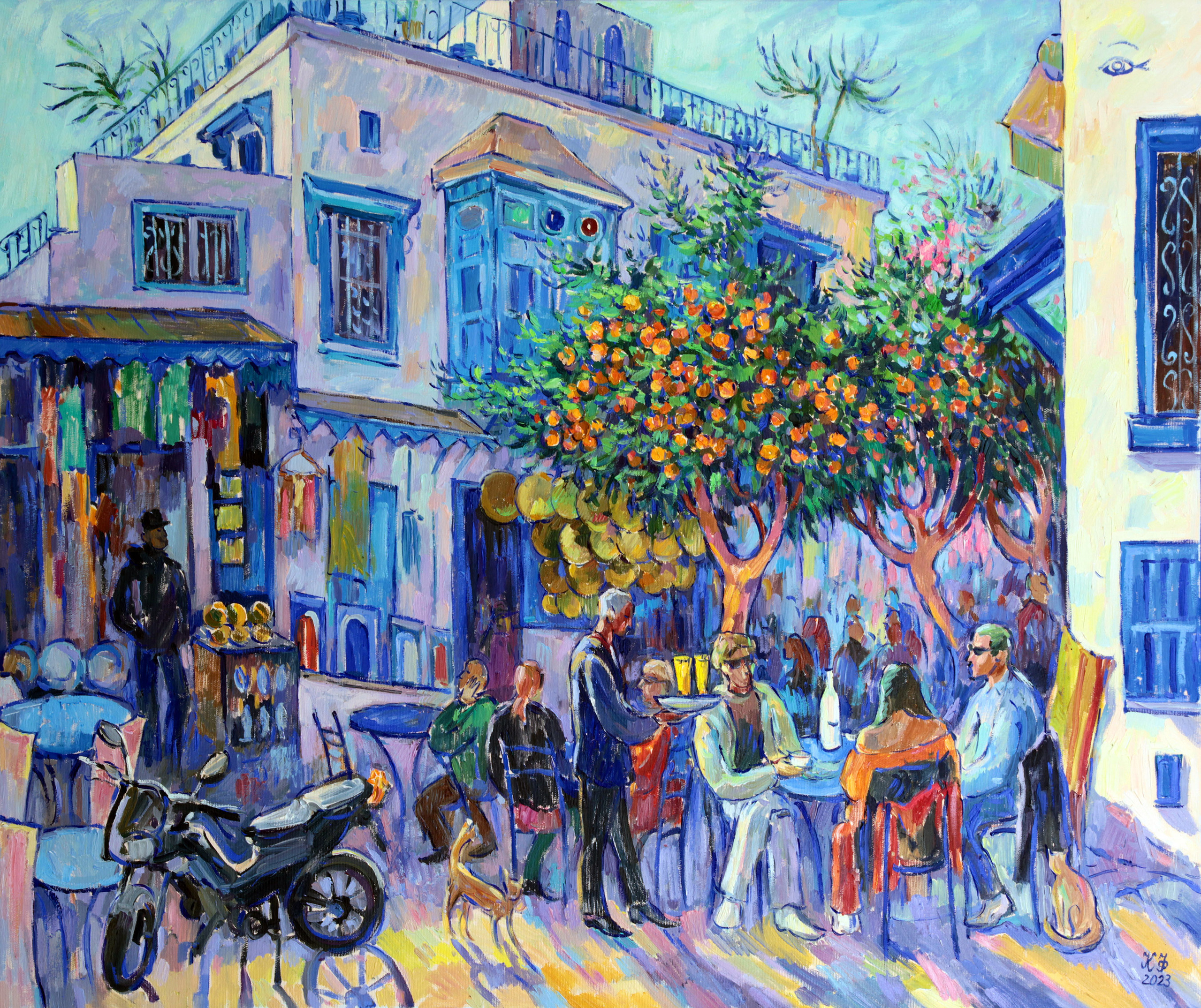A group of tourists drinking coffee under an orange tree