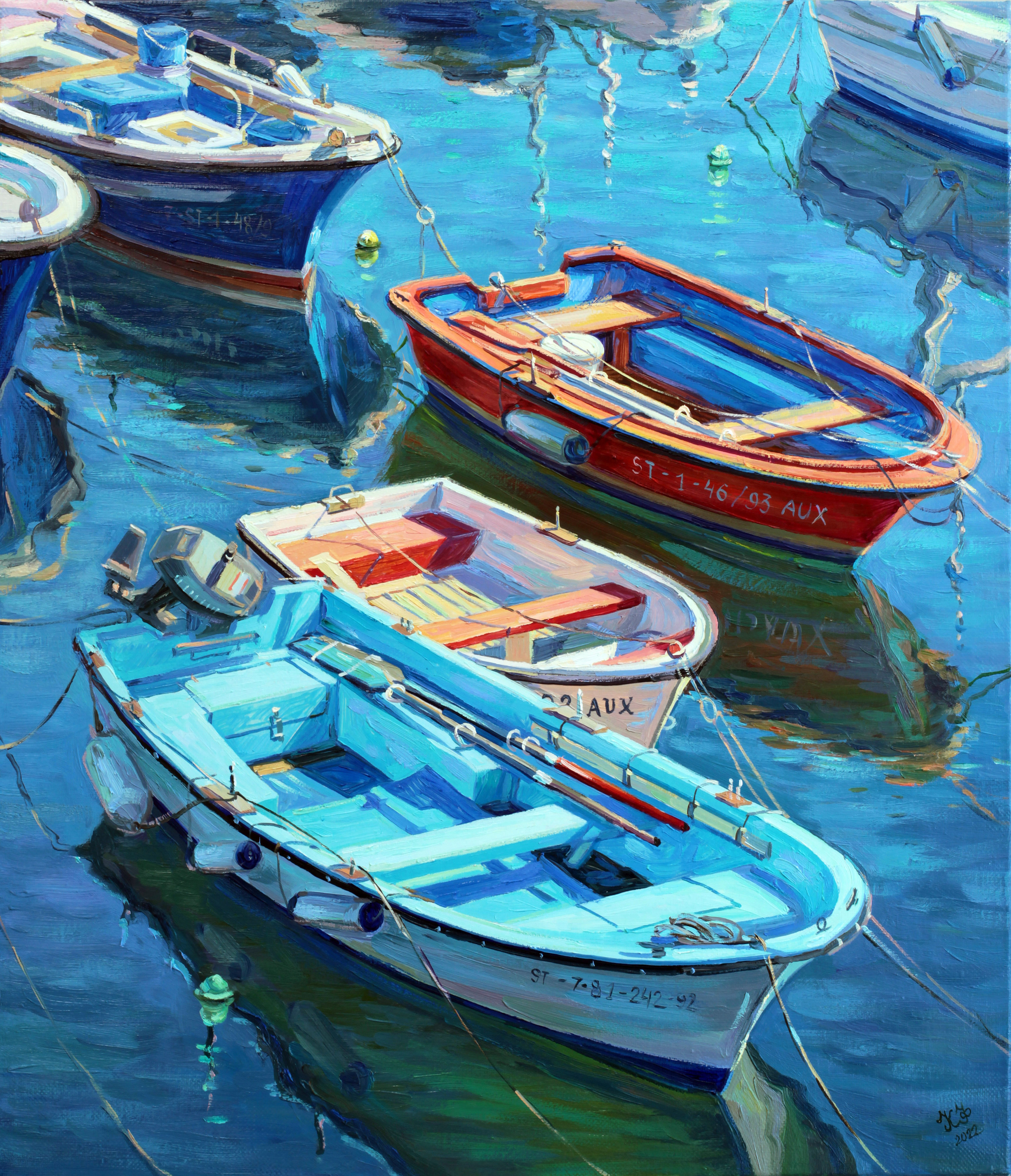 Light blue, white, and red boats: a trio