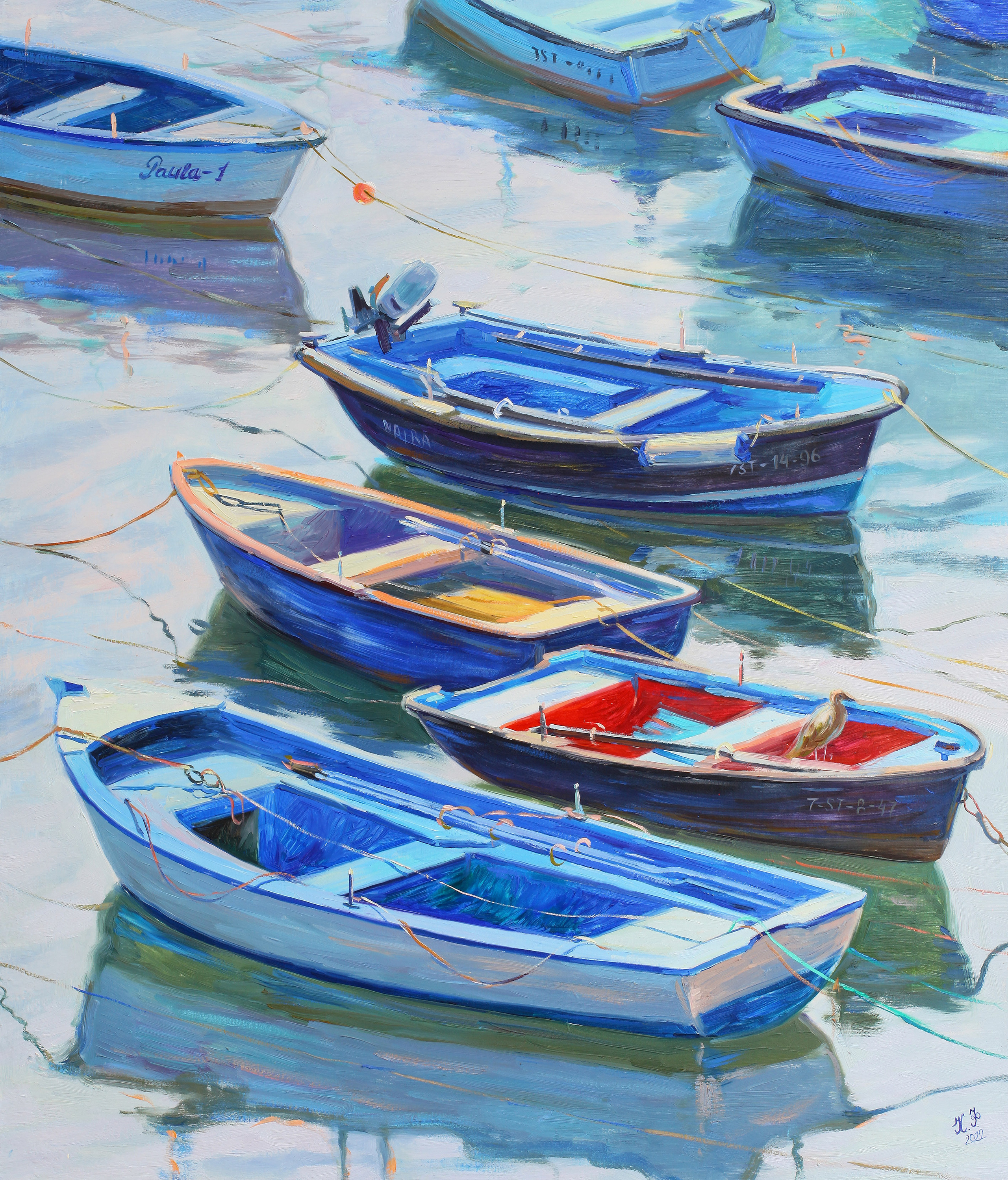 Orange and yellow boats between the two blue ones