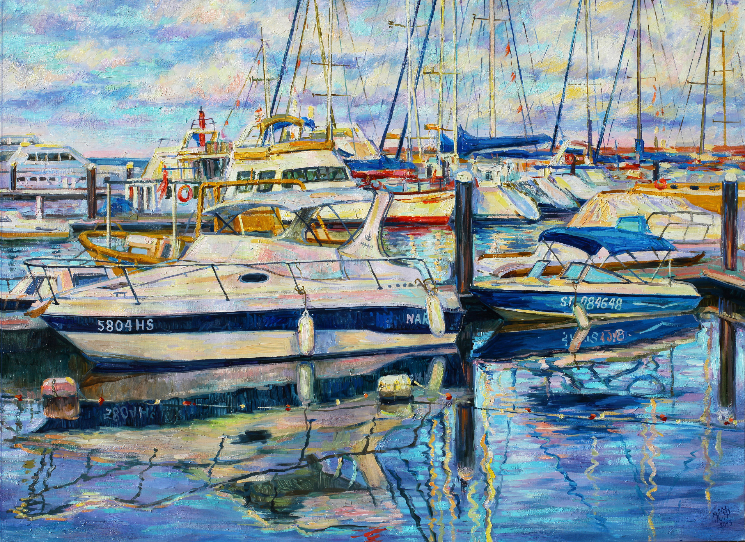 Modern yachts at sunset