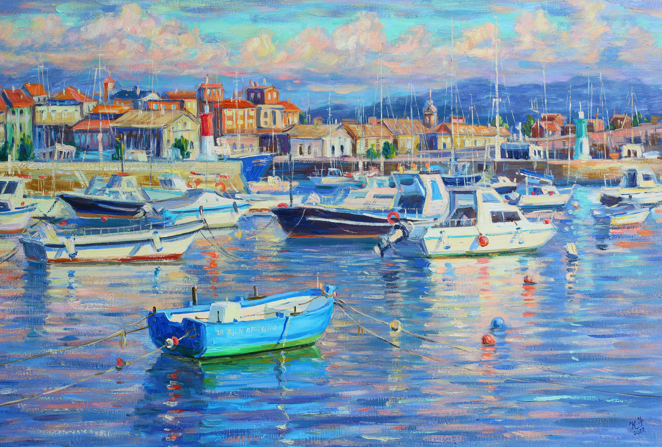 Panorama of the bay with fishing boats at sunset