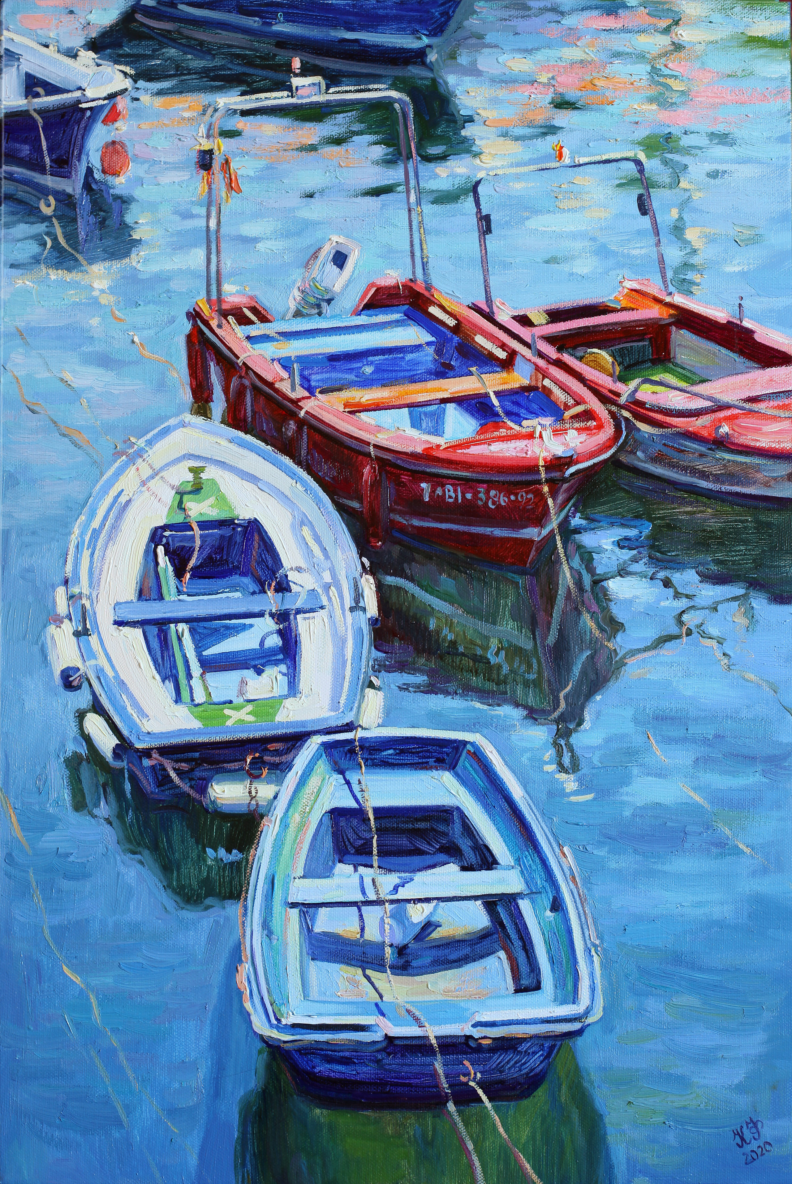 Two blue and two red boats