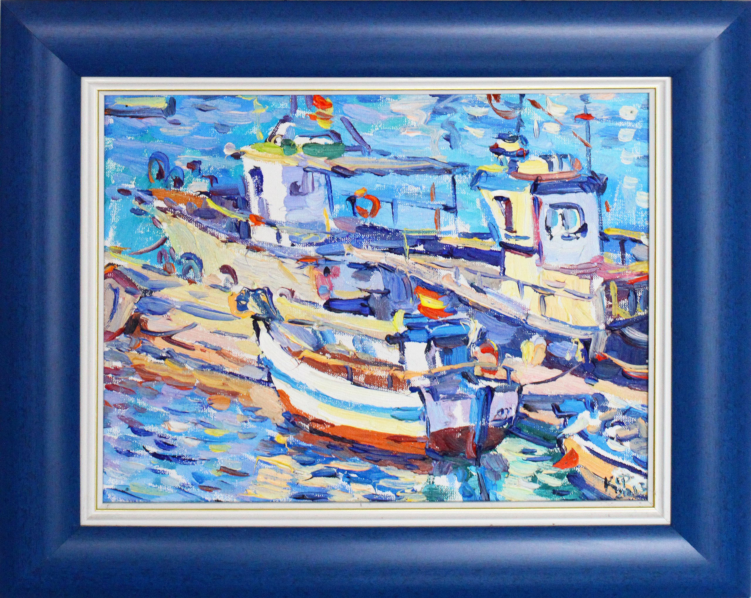 A fishing boat with the Spanish flag in the port of Rota