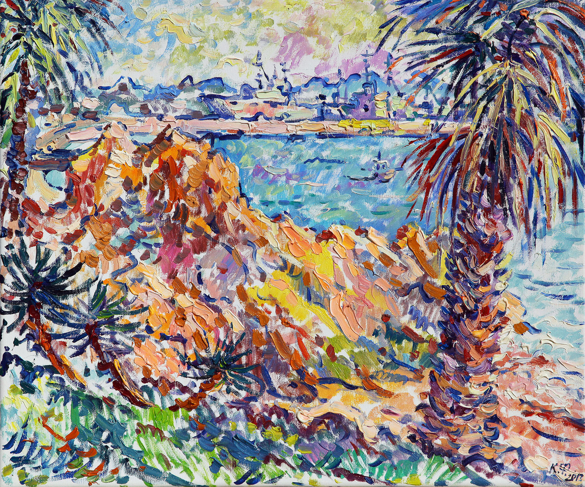 View of the sea from the Pinar De La Almadraba Park with a rock and a palm tree