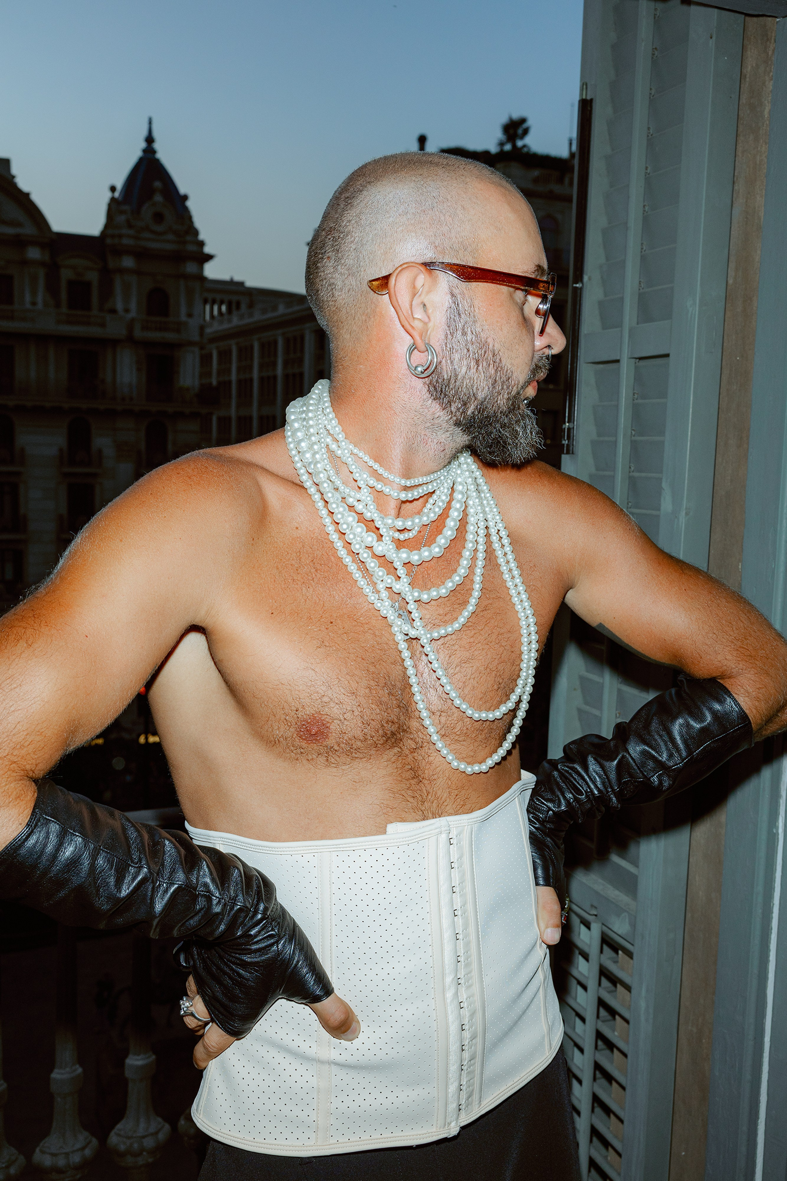 View of the Barcelona skyline behind a lively private party