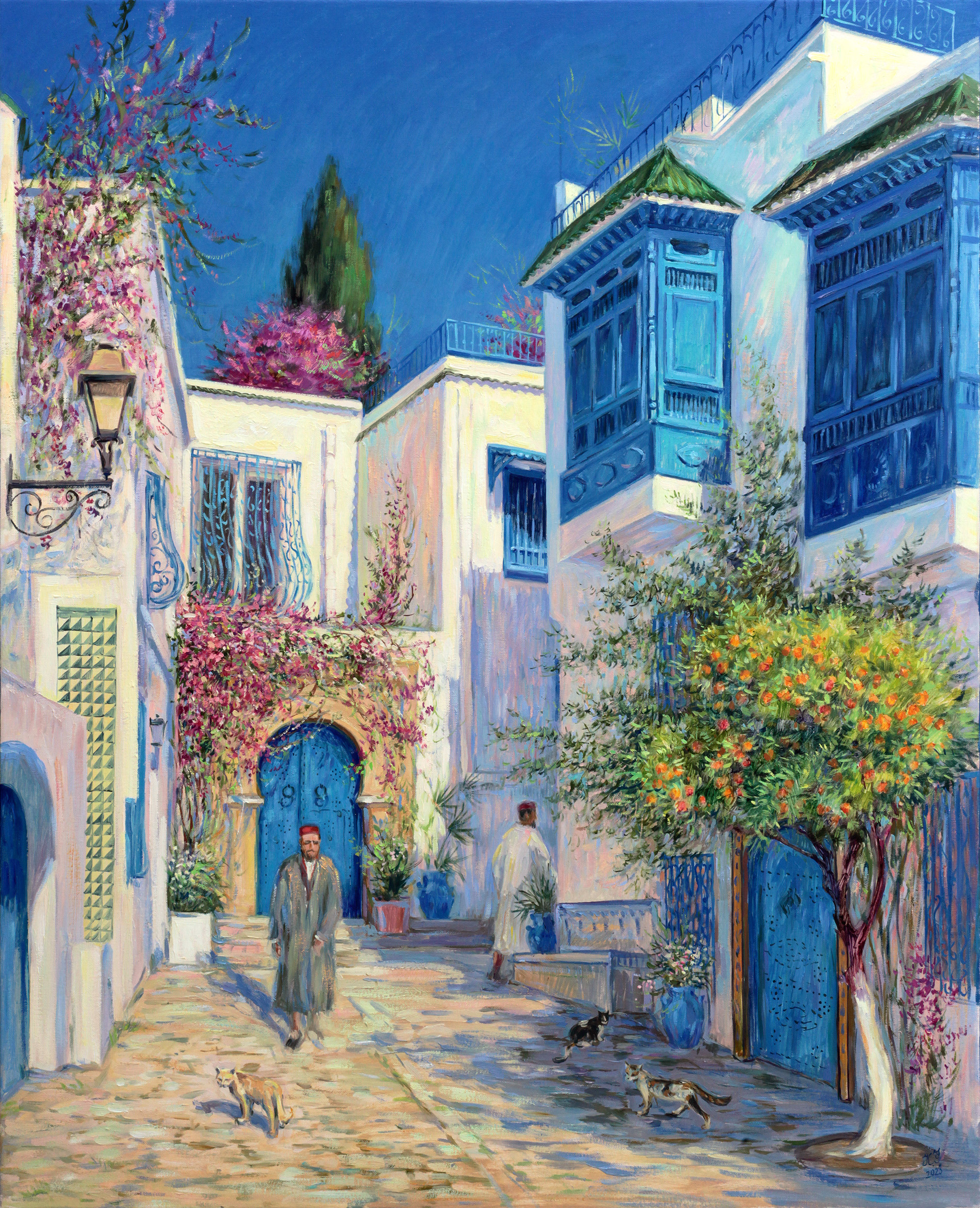 Quiet street in Sidi Bou Said with a local resident and cats.