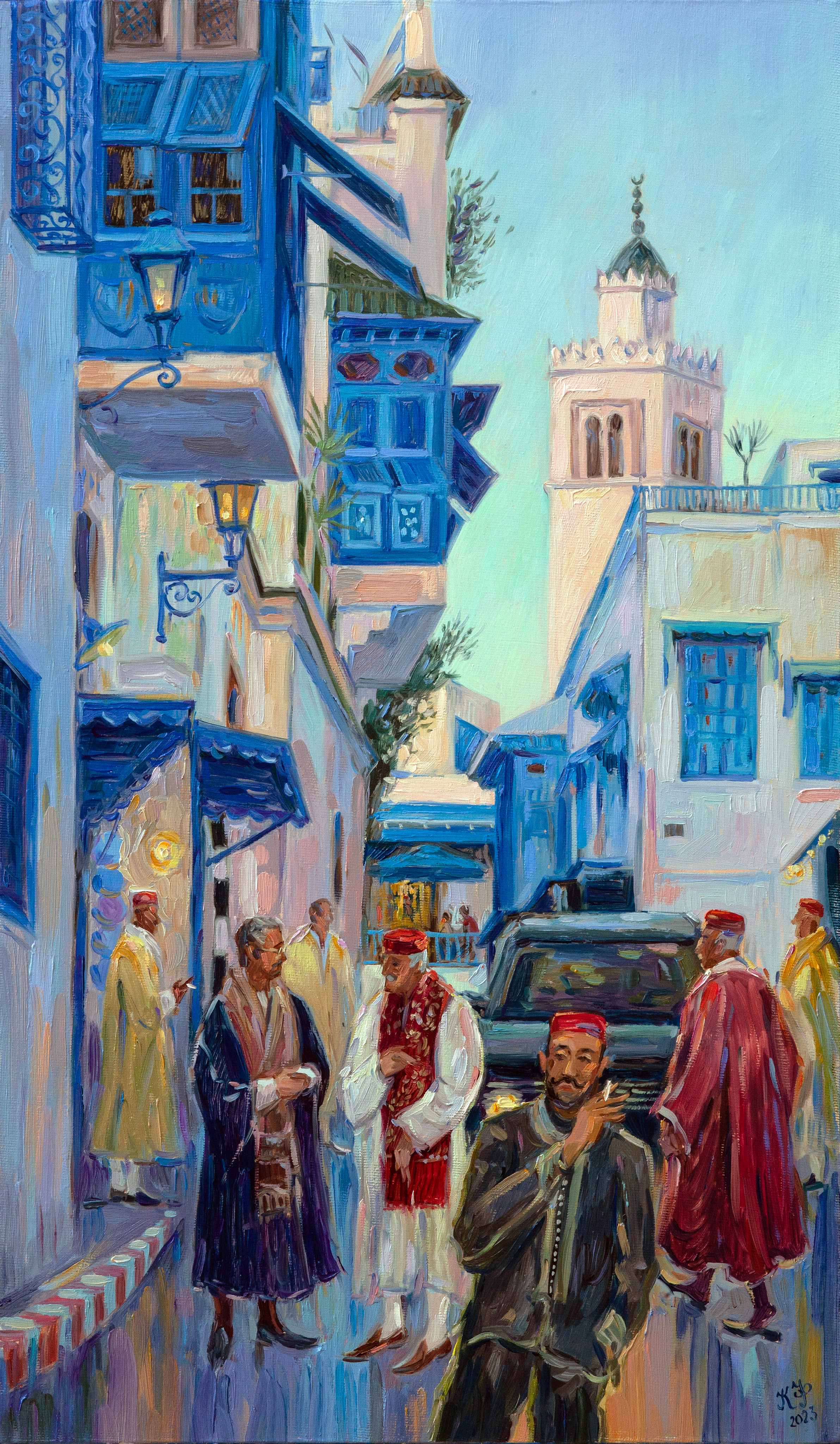 Men wearing traditional attire as they prepare for a wedding ceremony.