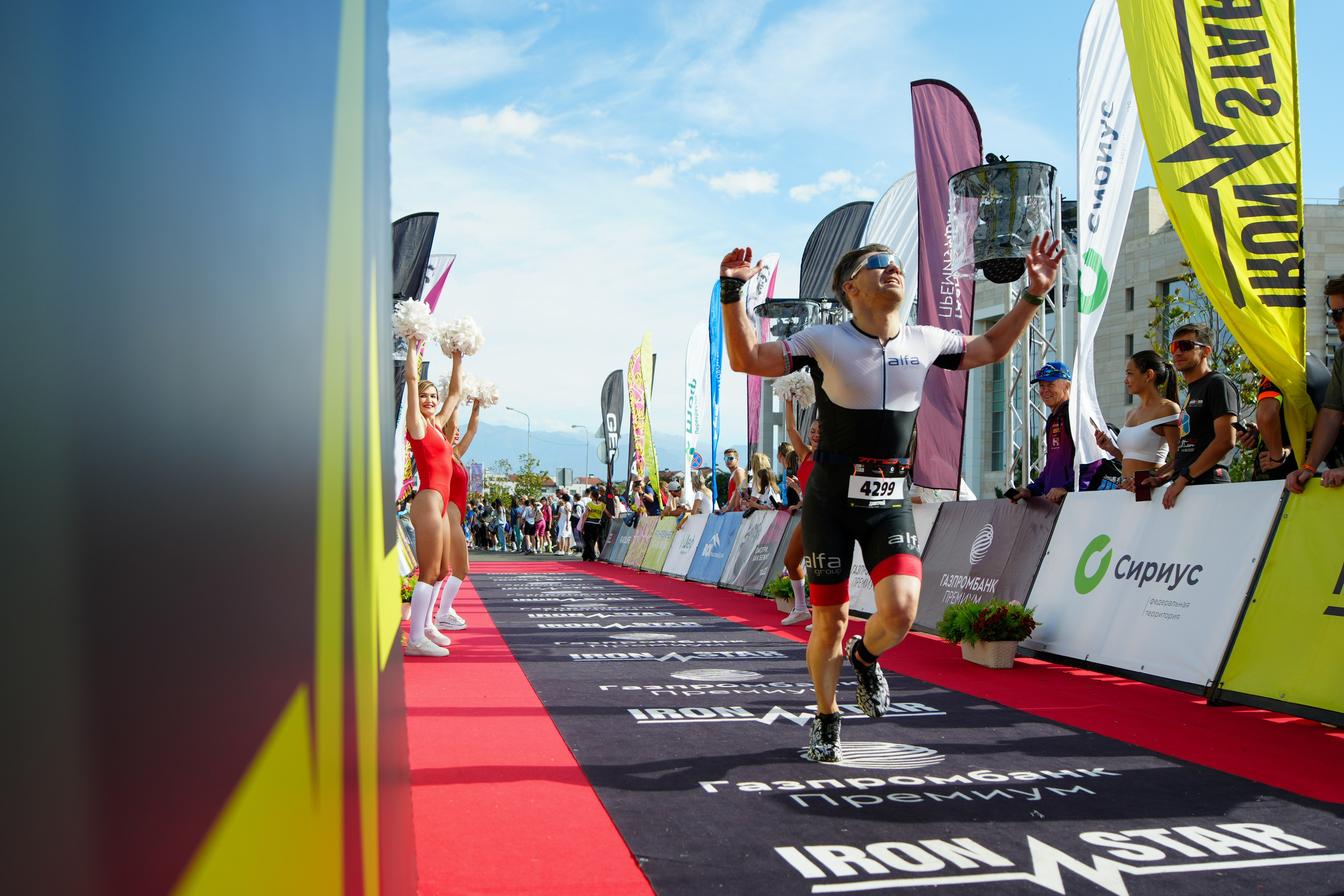 Фотоотчет партнерской интеграции для компании TELE2 на фестивале Ironstar. Репортажный фотограф в Красной Поляне и Сочи Павлюченко Екатерина