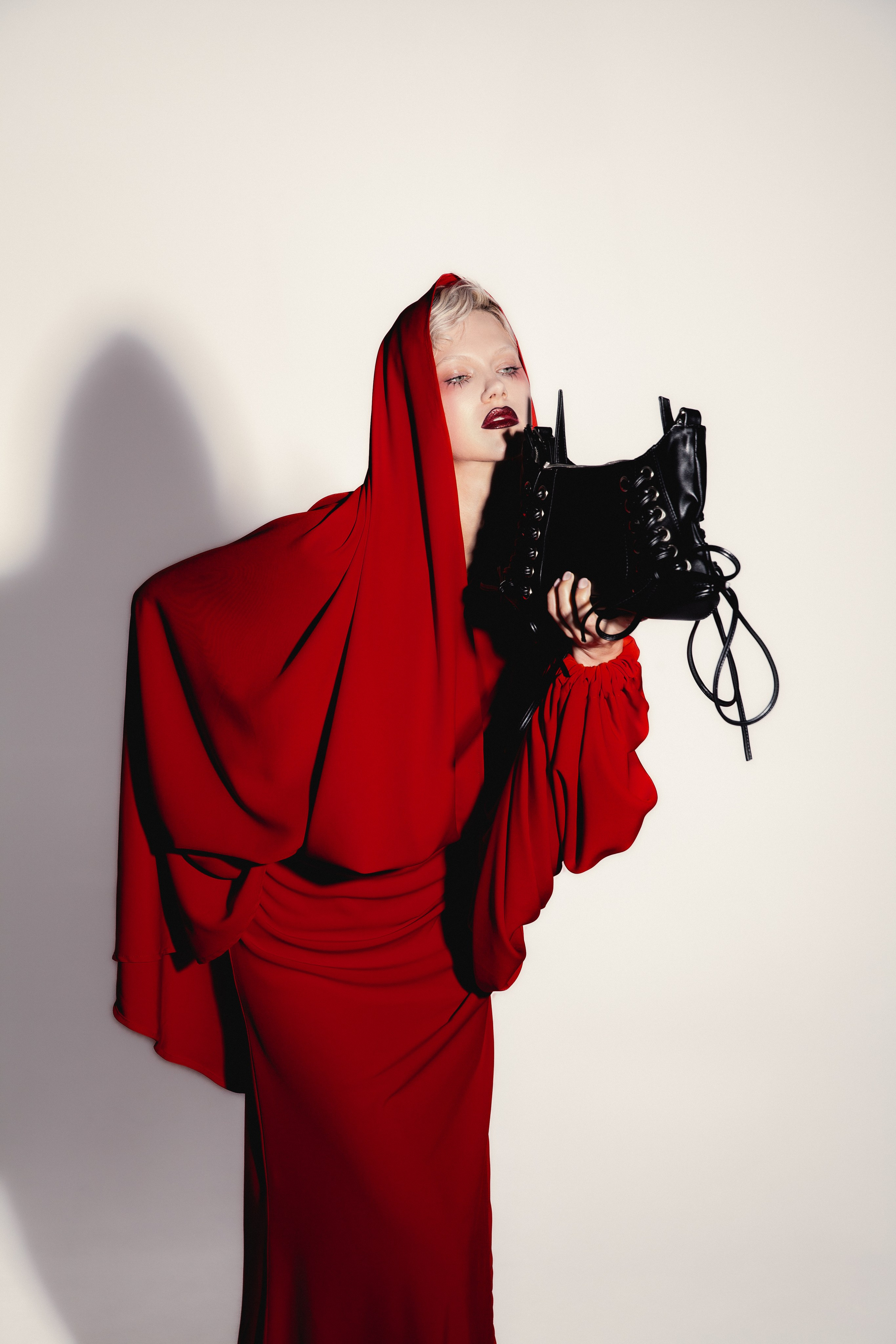 Red. Photographer. Producer. Retoucher