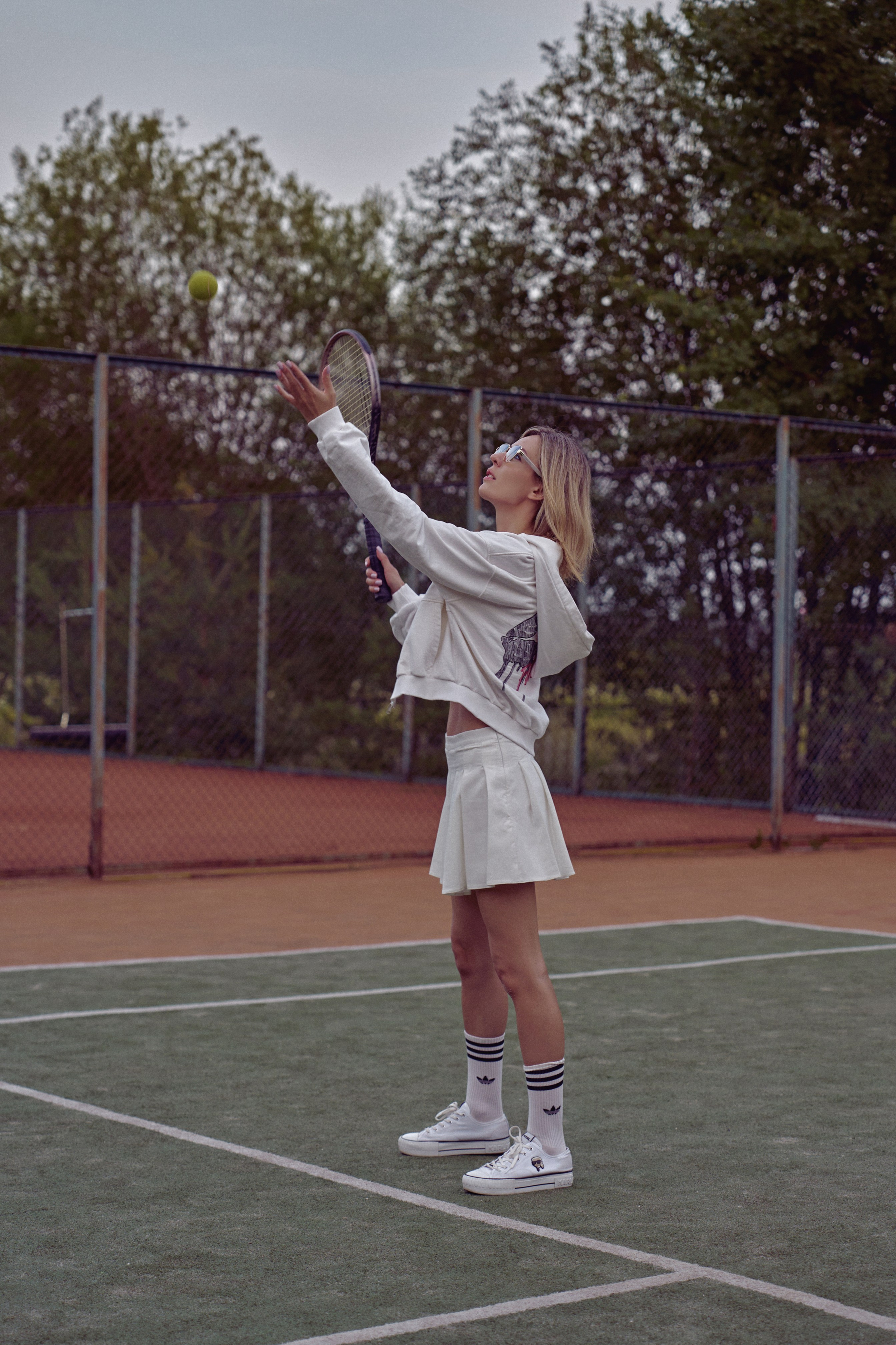 Теннисный корт. Фотограф