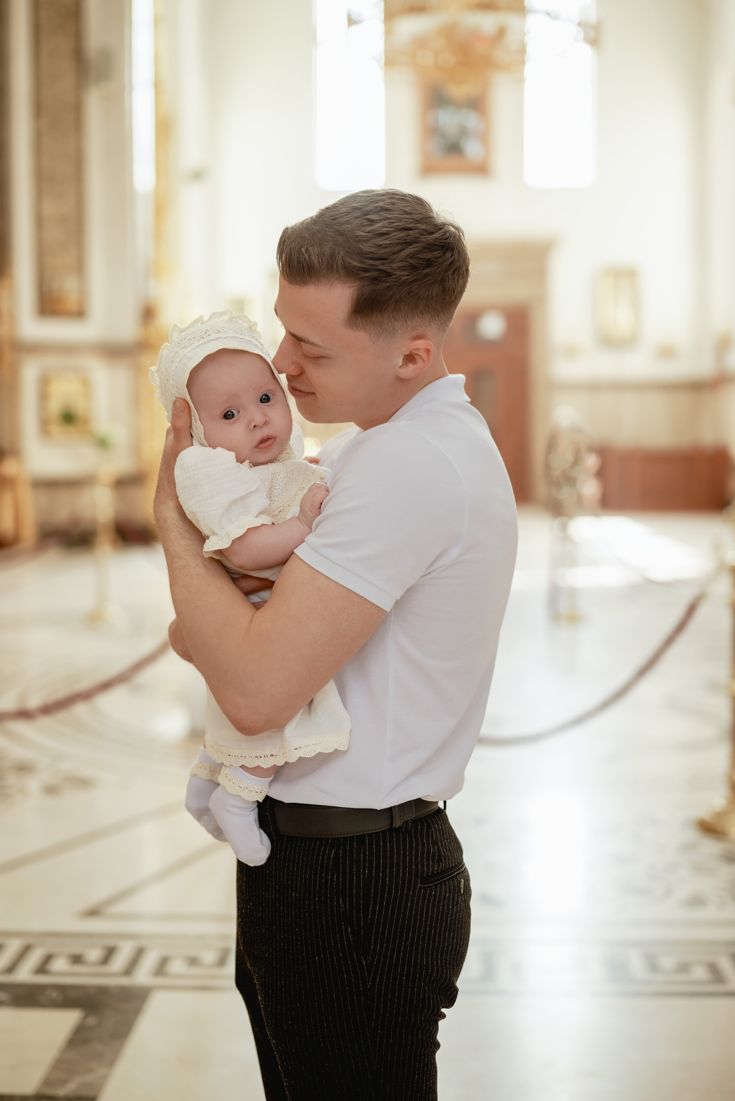 Крещение в храме Петра и Февронии. Юлия Басня семейный и свадебный фотограф в Донецке