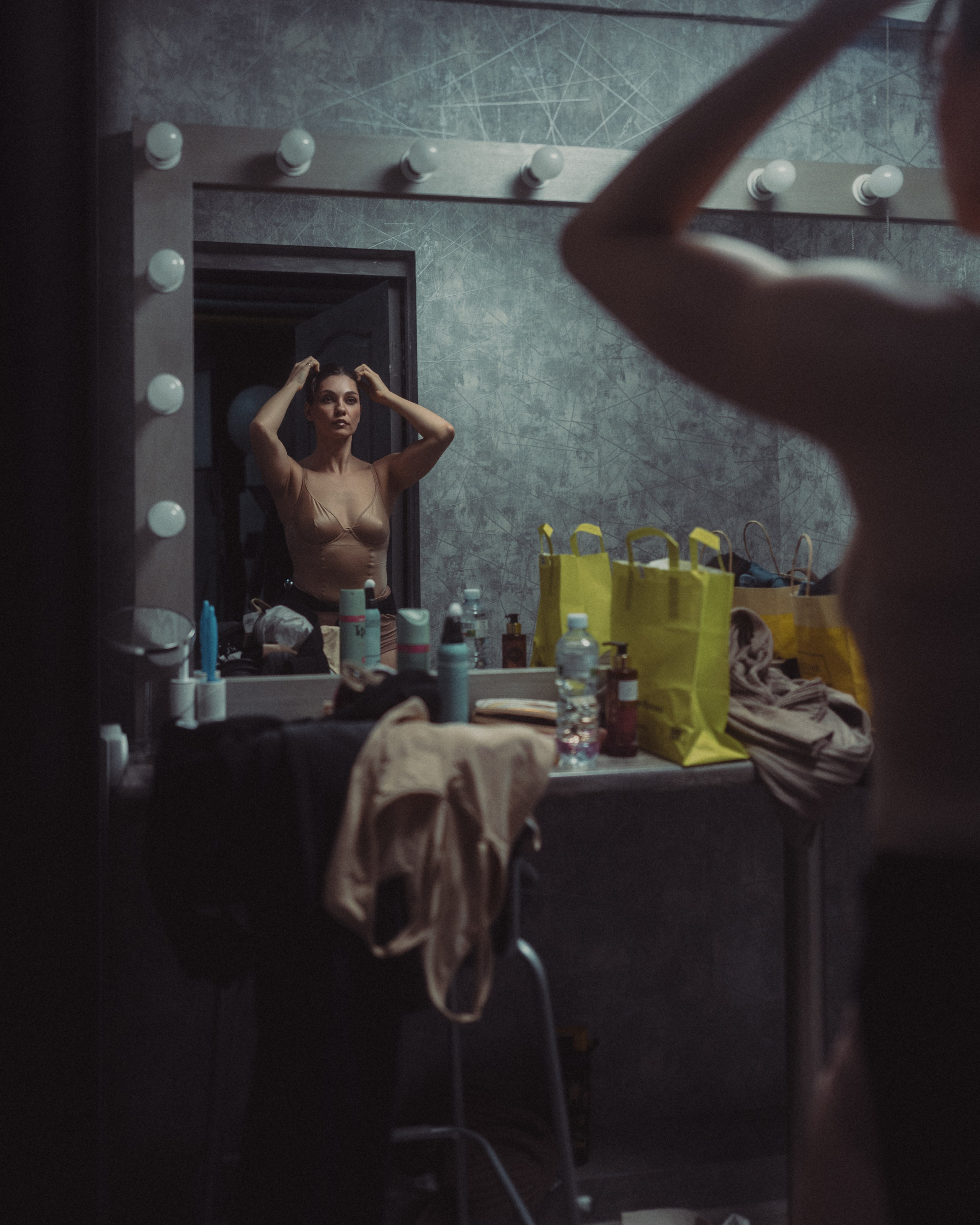 Reportage photoshoot with dancers in a cinema pavilion  by Anton Avanzato