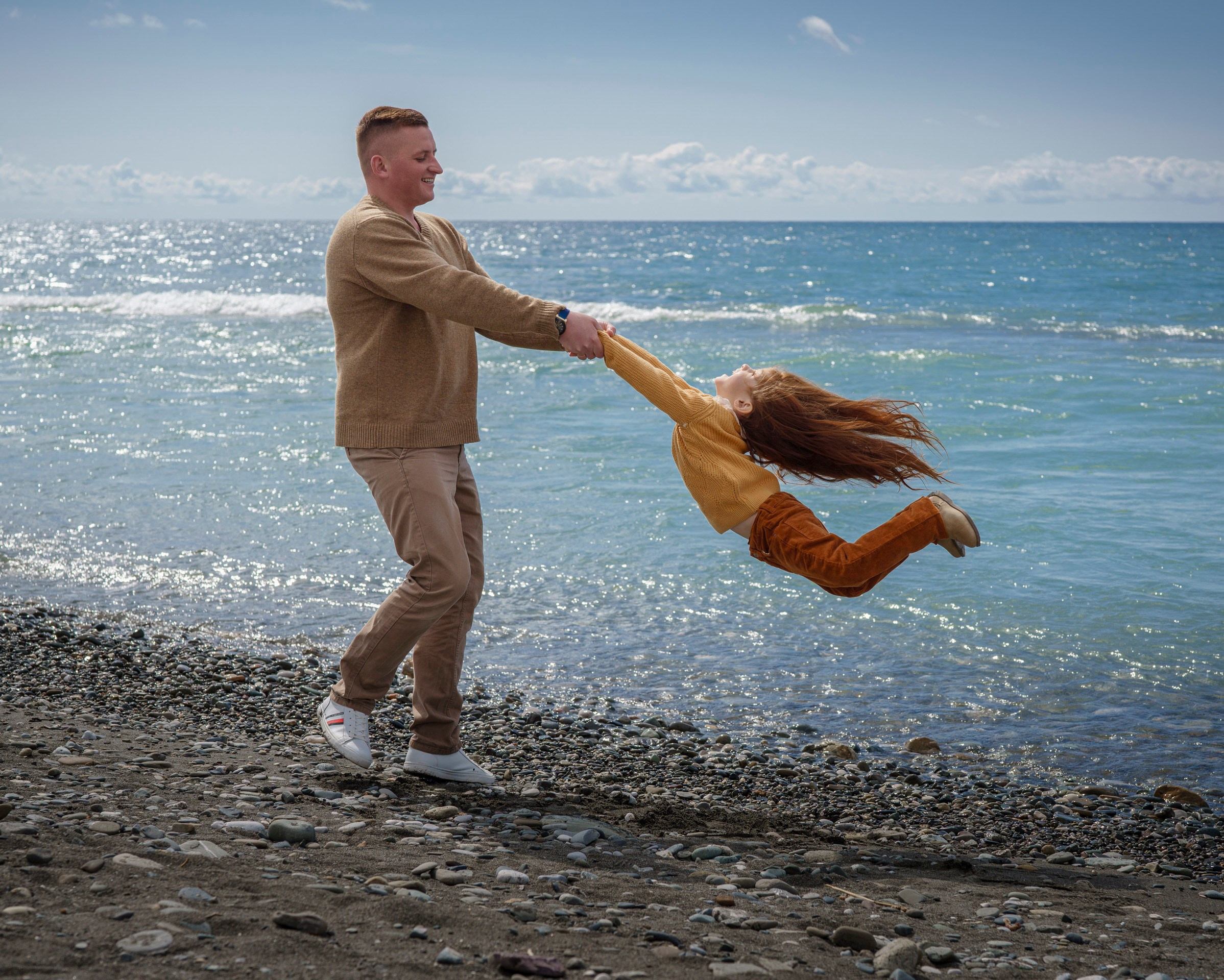 Семья на пляже. Фотограф Сергей Танков