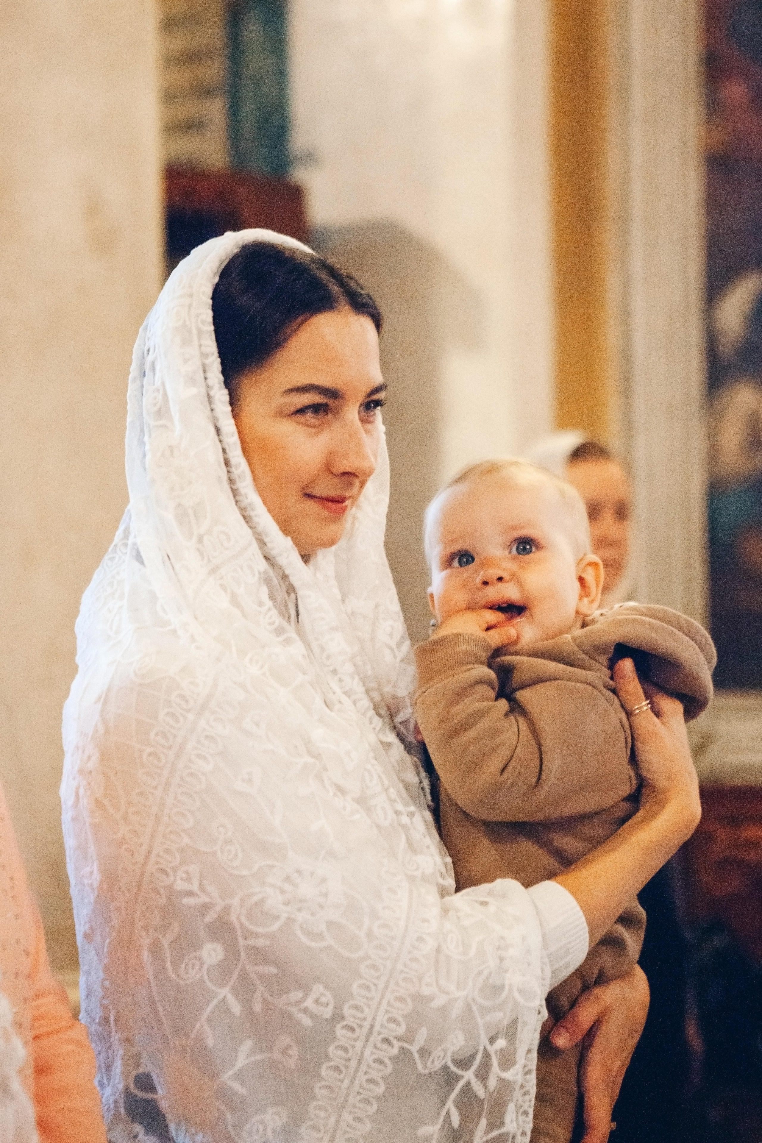 Крещение ребенка в церкви. Фотограф Ольга Ефремова