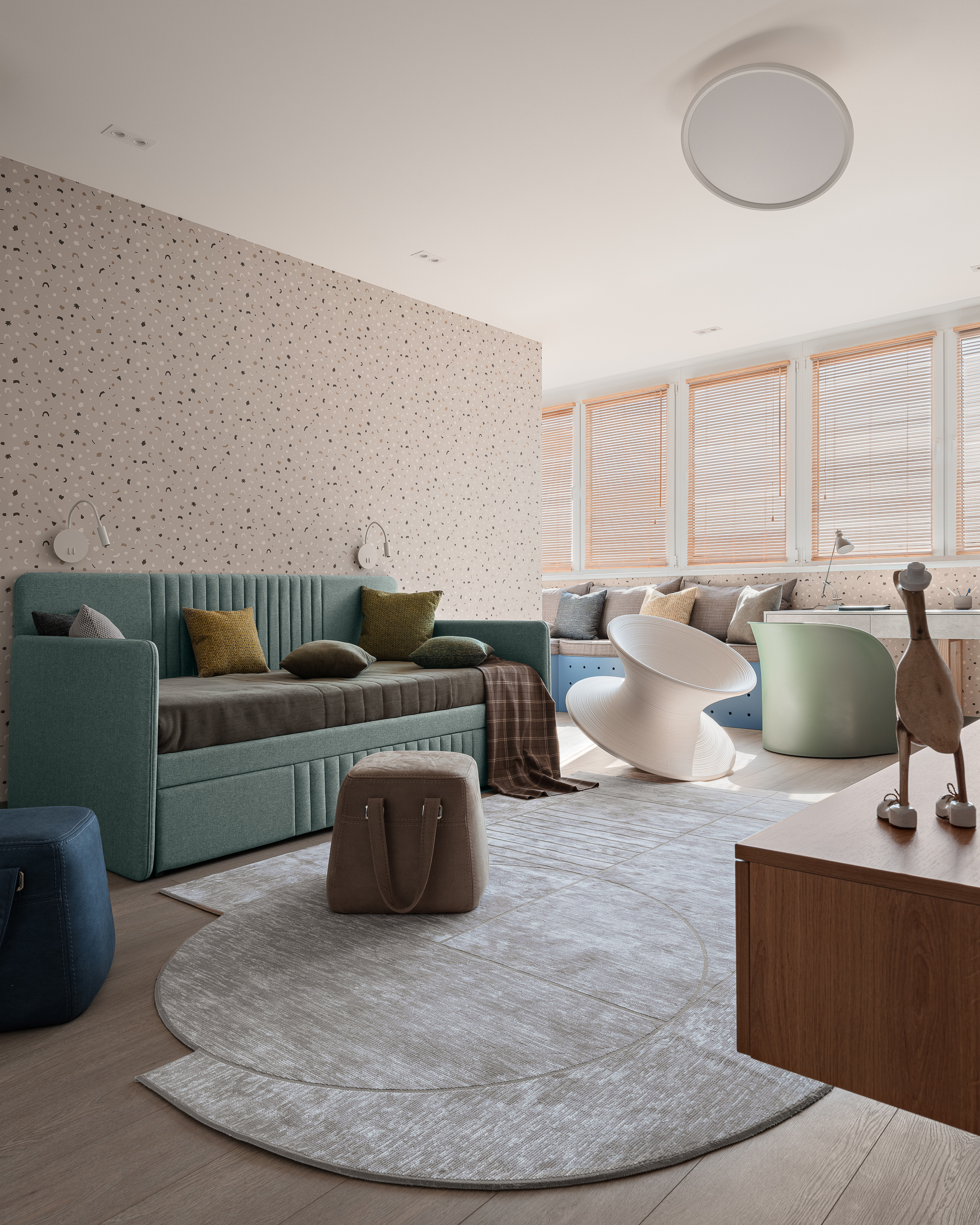 Просторная детская с серым круглым ковром, бирюзовым диваном, дизайнерскими креслами и встроенной рабочей зоной у панорамных окон. Атмосфера гармонии от Алёны Сверловой, интерьер запечатлён Сергеем Денисенко.