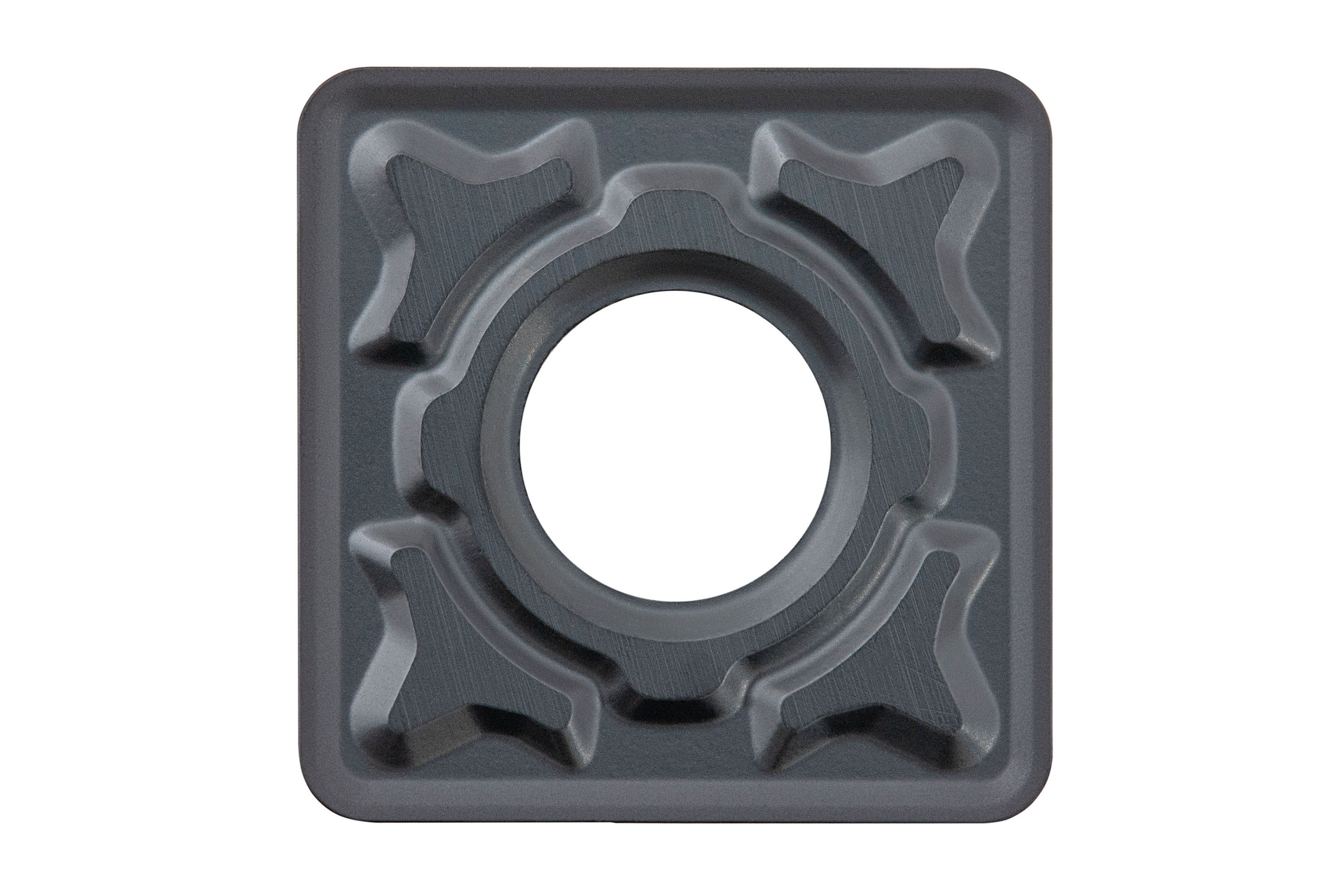 Фото крупным планом режущей пластины, видна структура покрытия и фаска