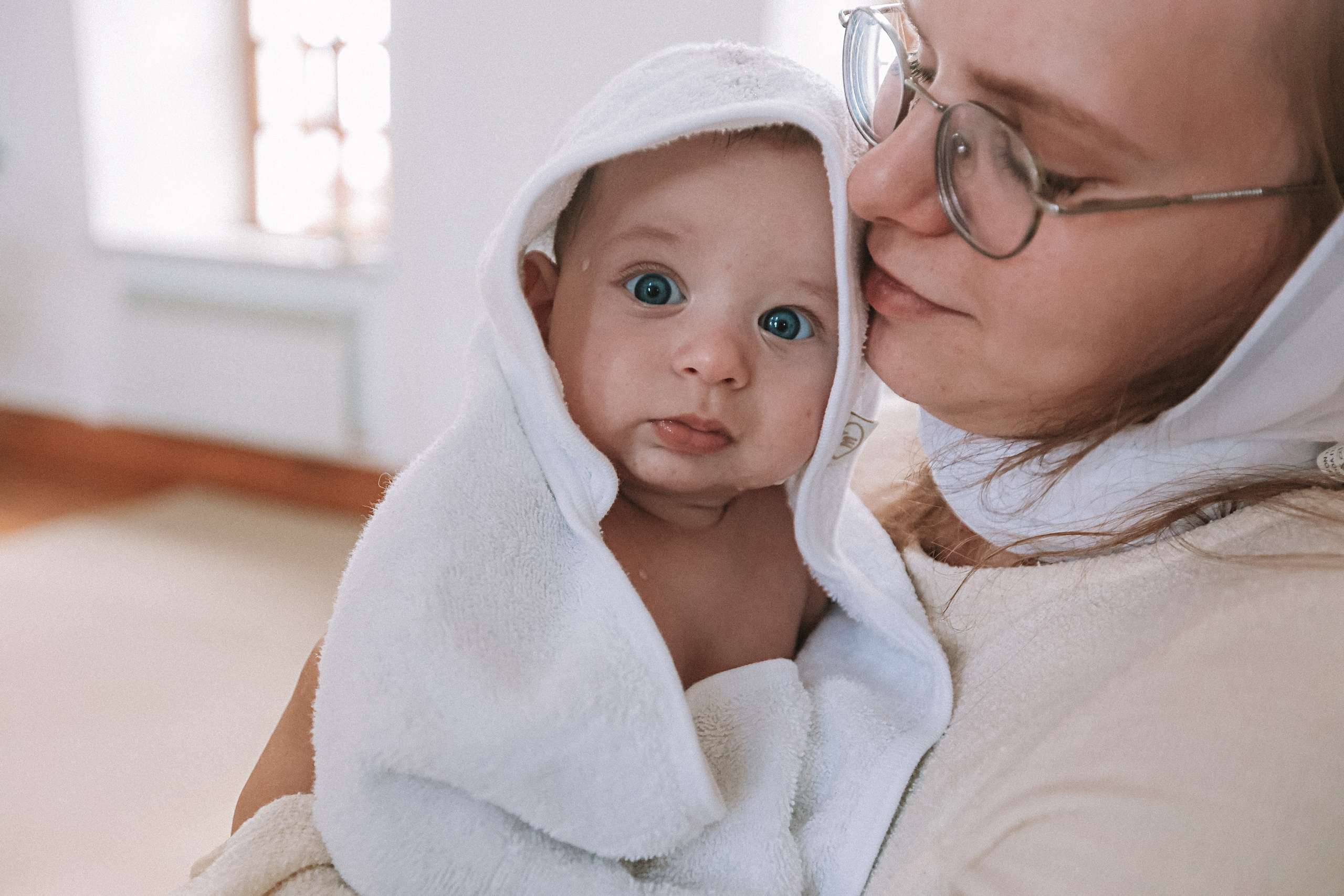Крещение церковь около моста влюбленных. Семейный фотограф Тюмень, фотограф на роды Салмина Мария
