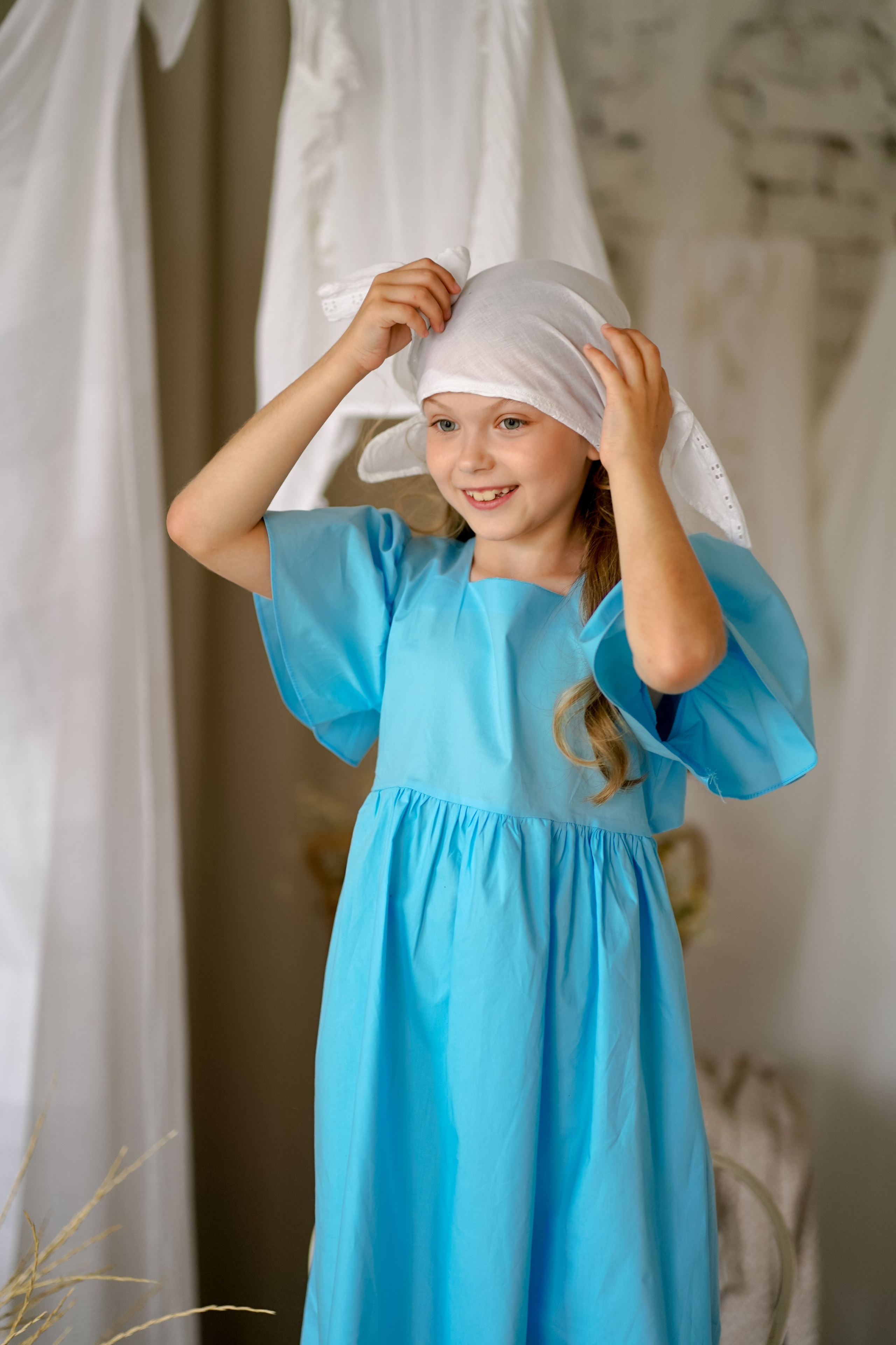 Кира с подсолнухами. Фотограф Татьяна Митрофанова