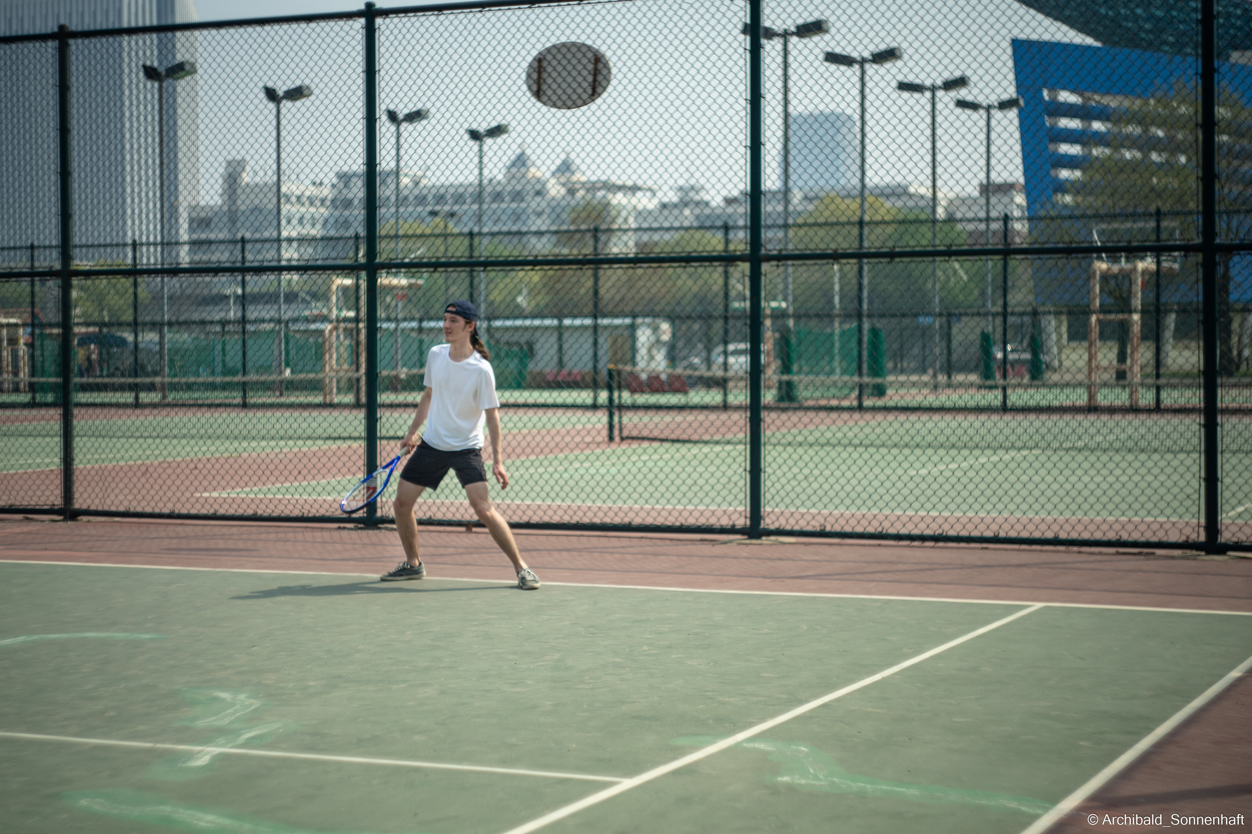 Tennis!. Photographer in Guangzhou, China. Archibald Sonnenhaft