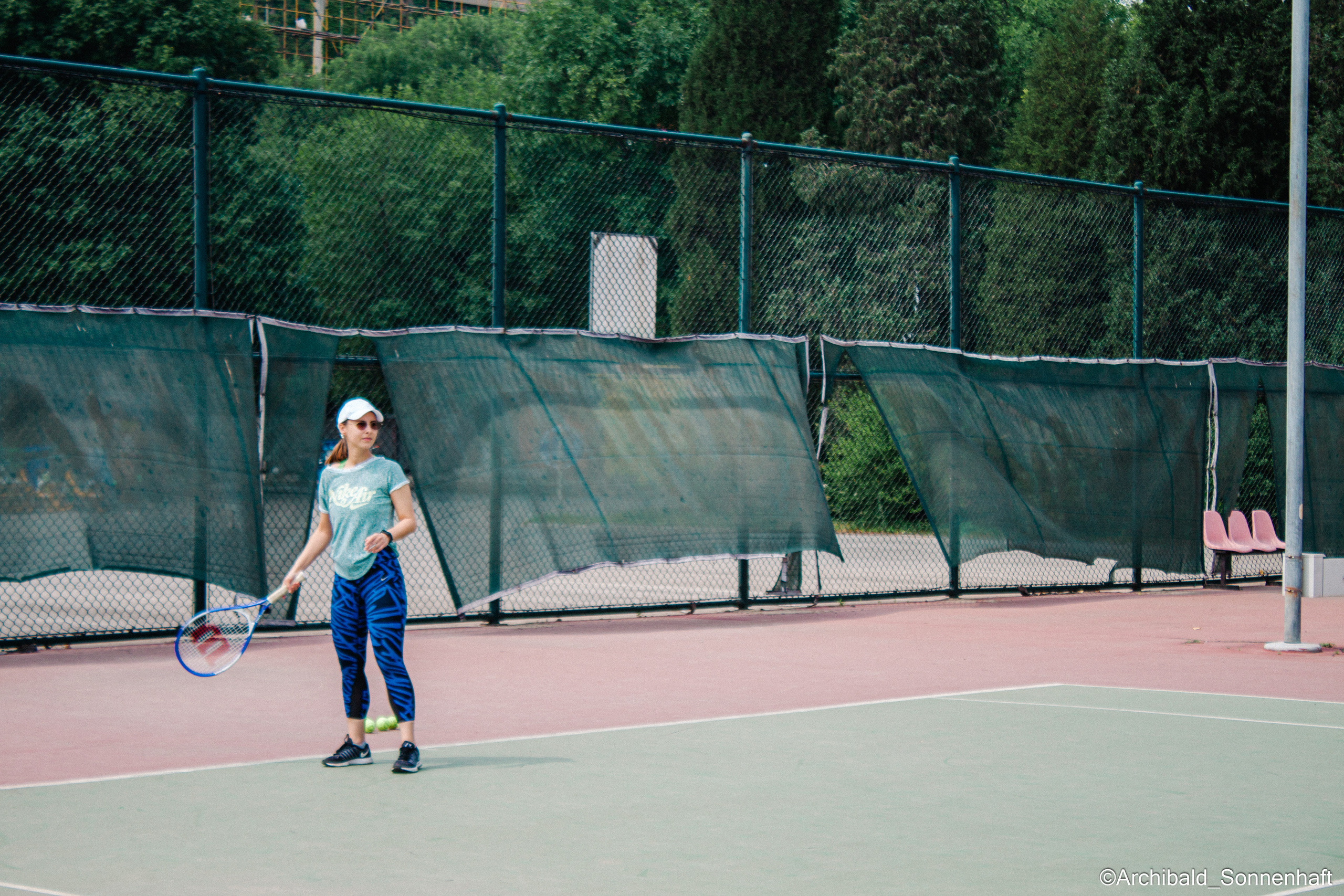 Tennis morning. Photographer in Guangzhou, China. Archibald Sonnenhaft