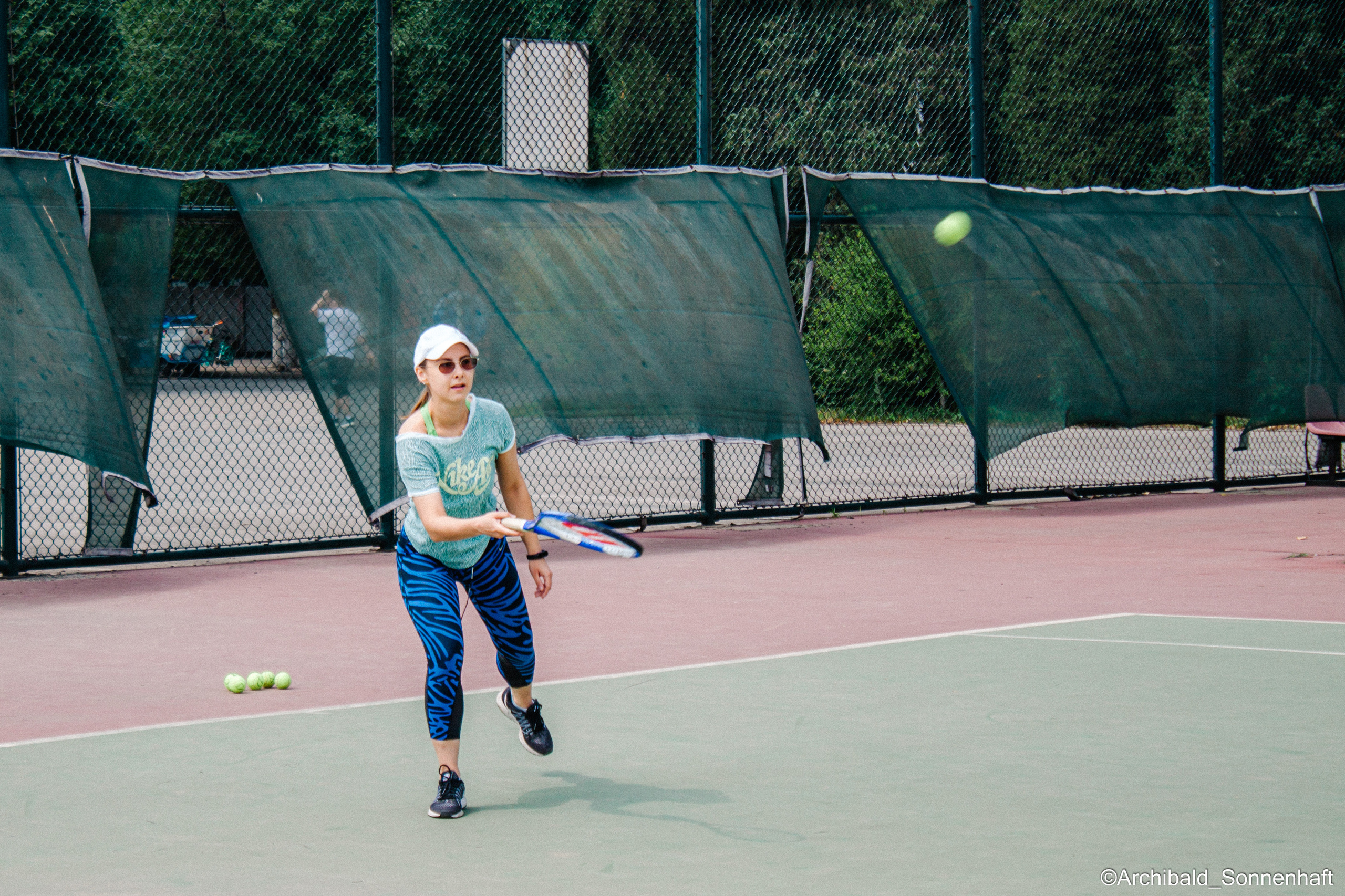 Tennis morning. Photographer in Guangzhou, China. Archibald Sonnenhaft
