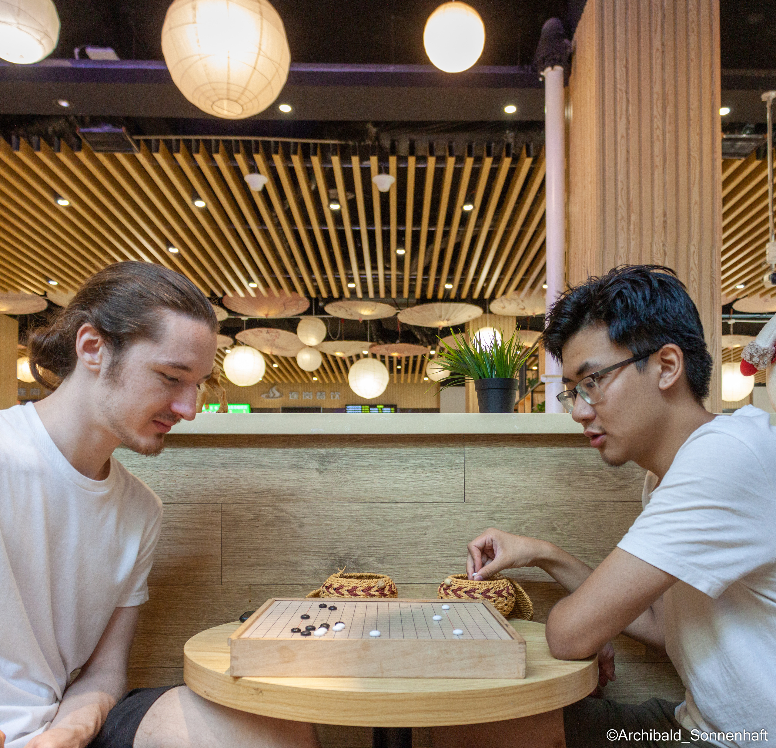 Tennis morning. Photographer in Guangzhou, China. Archibald Sonnenhaft