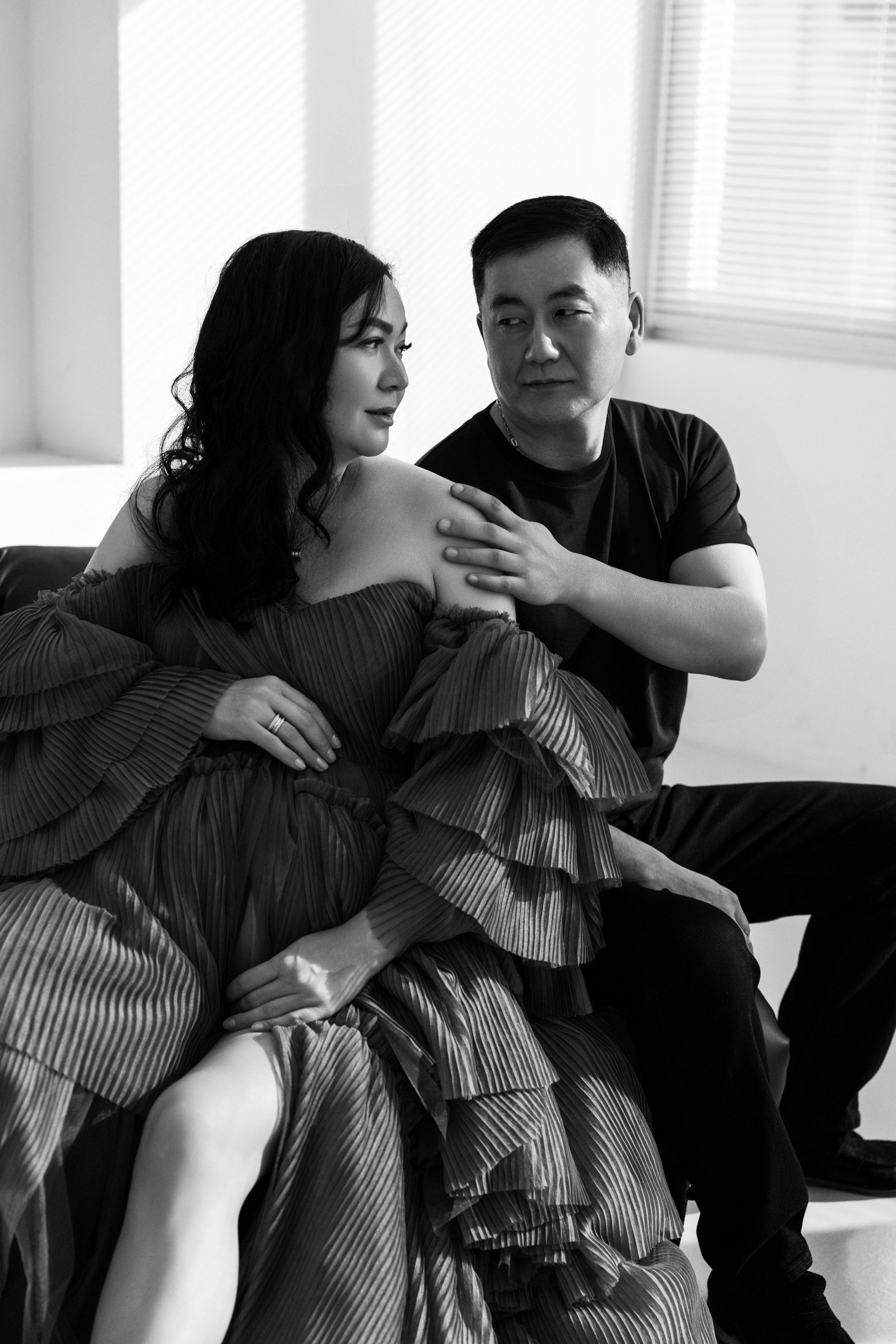 Pregnancy photo session with husband in studio