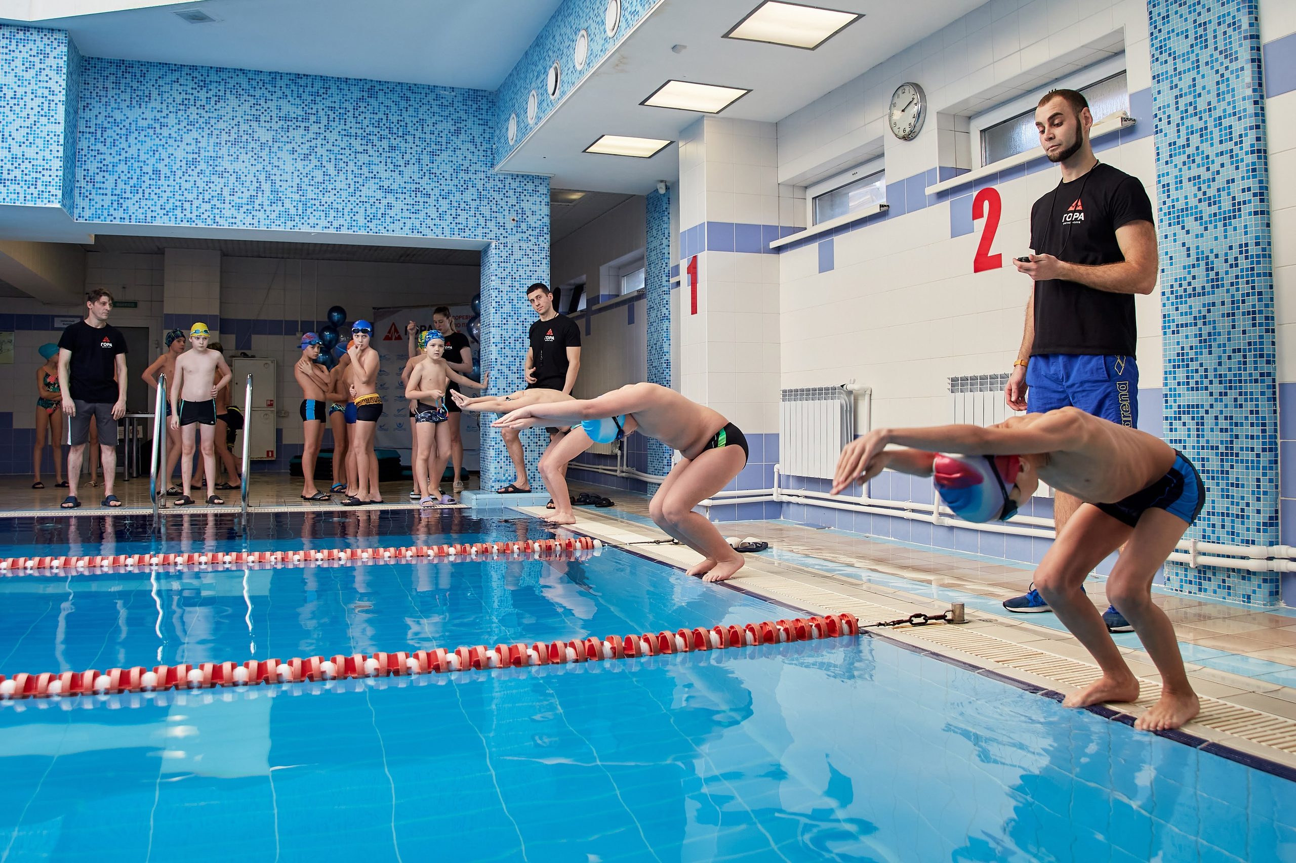 Соревнования по плаванию. Фотосессия в бассейне