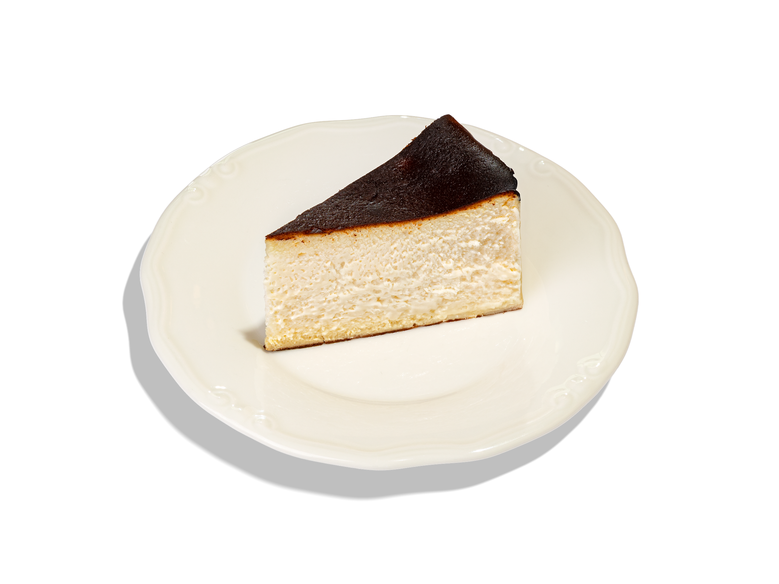 ЧИЗКЕЙК САН_СЕБАСТЬЯН 550 ₽. Нежнейший испанский десерт Сан-Себастьян, выпекается при высокой температуре, что придает ему карамельную  корочку. В основе лежит творожный сыр  и сливки, придающие  ему особую гладкость и шелковистую структуру. Сочетание сахара и ванильной пасты создают деликатную сладость. По желанию гостя чизкейк поливается горячим шоколадом на основе молочного шоколада и сливок.