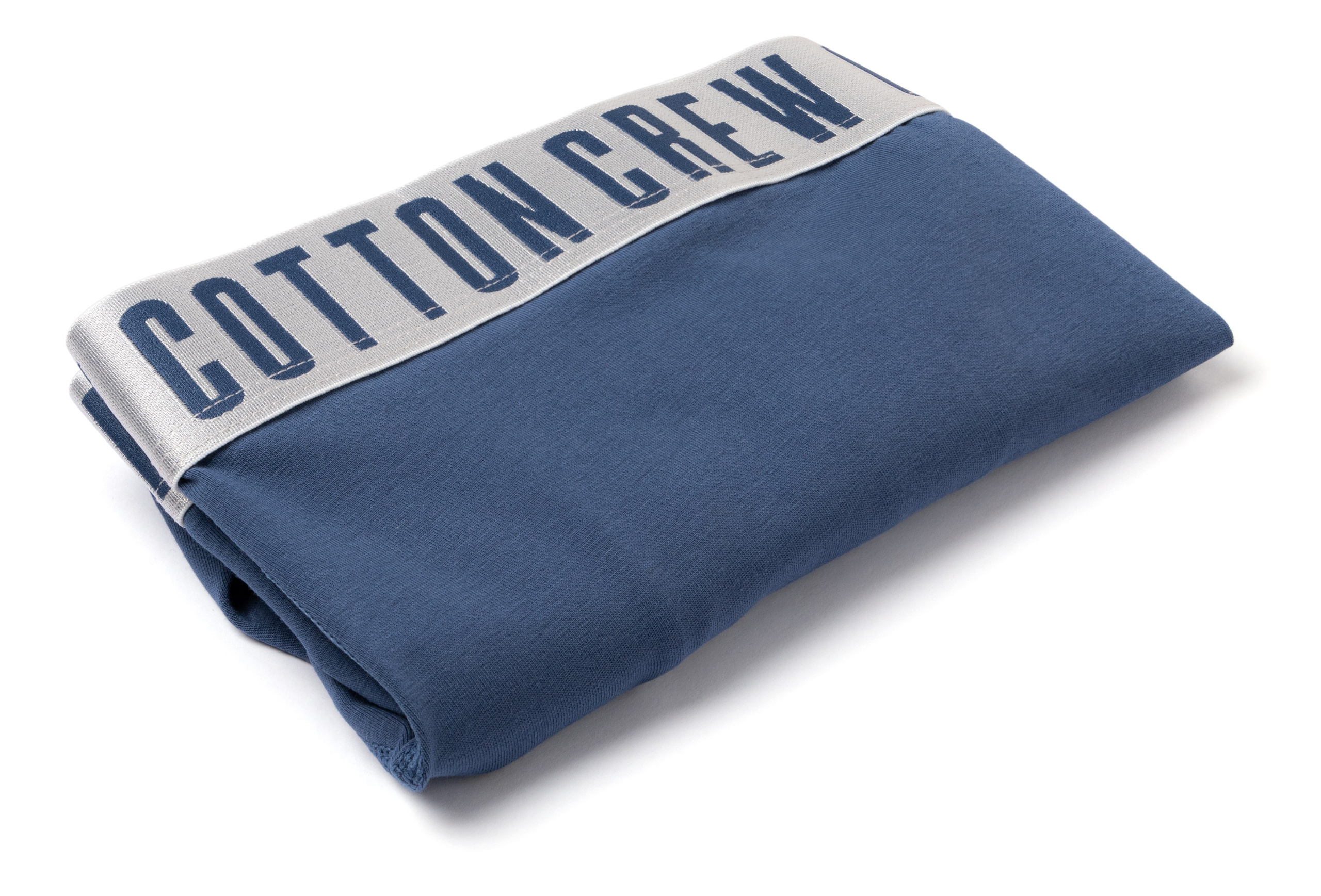 Синие боксеры сложенные на белом фоне | Съемка для интернет-магазина