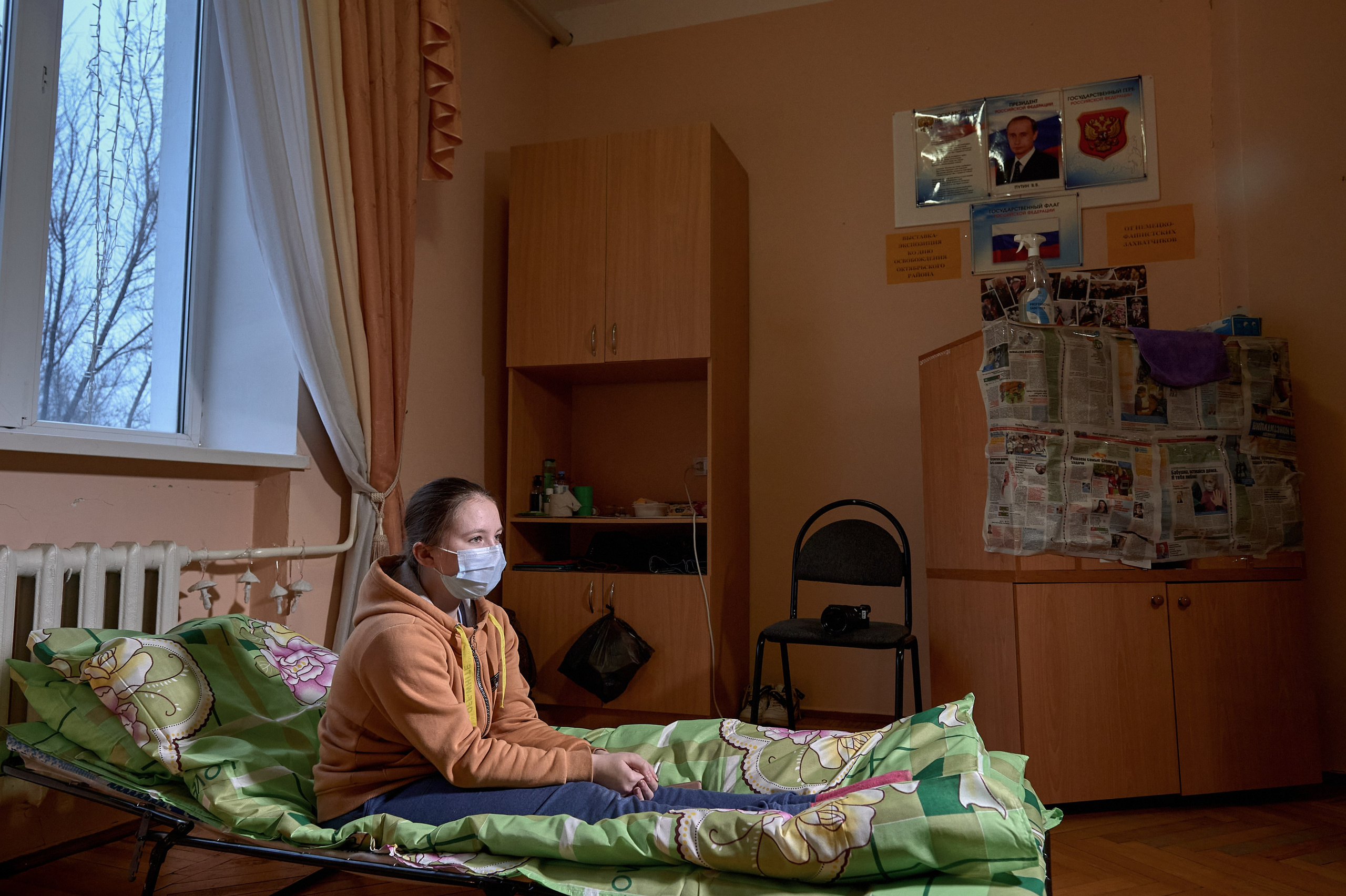 A child in a temporary refugee accommodation center set up in the cultural center of the village of Krasnogornyatsky, Rostov region, February 26, 2022.