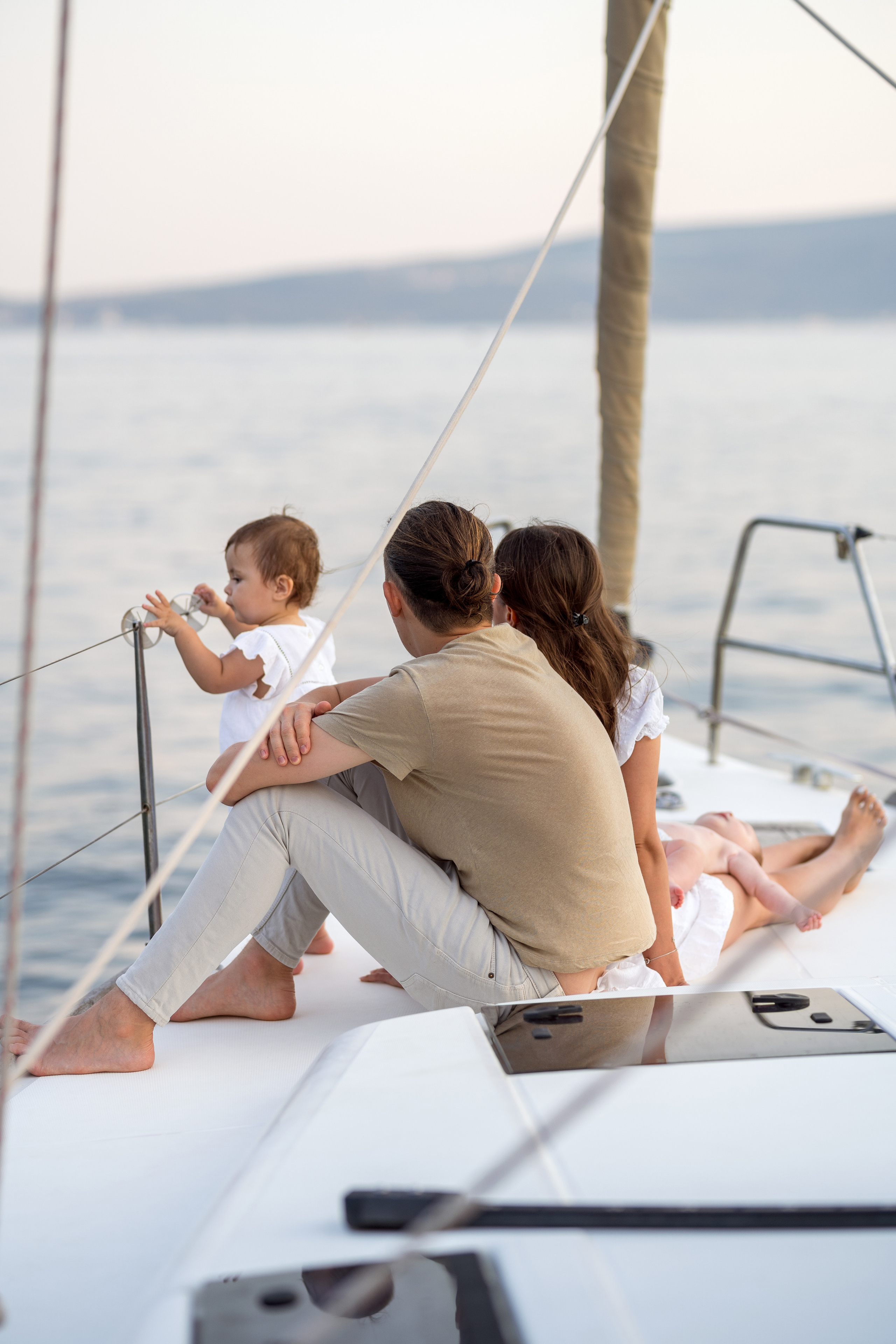 Family photoshoot on a yacht in the Bay of Kotor, Montenegro. Kate Khaldeeva photographer in Saratov