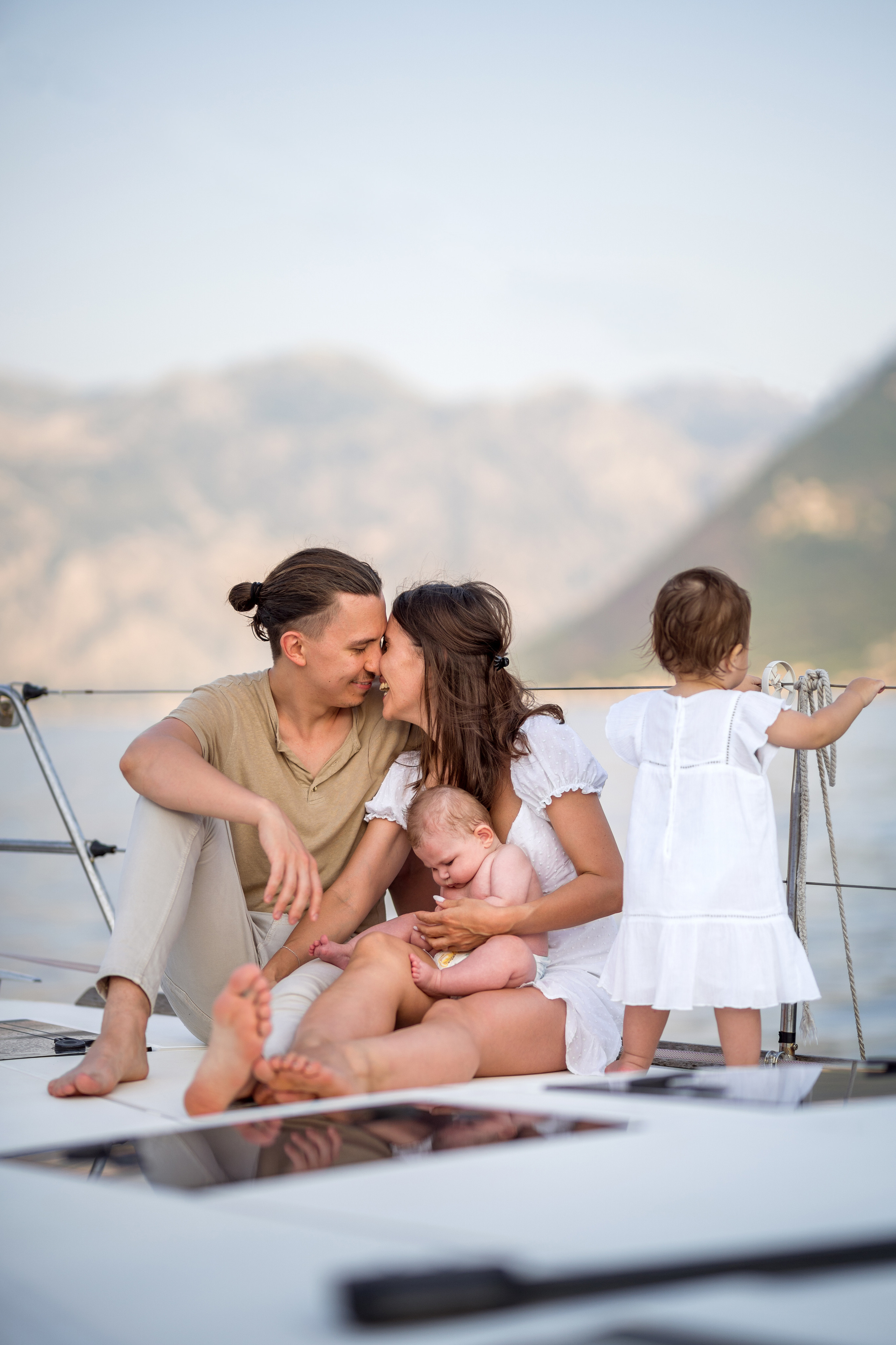 Family photoshoot on a yacht in the Bay of Kotor, Montenegro. Kate Khaldeeva photographer in Saratov