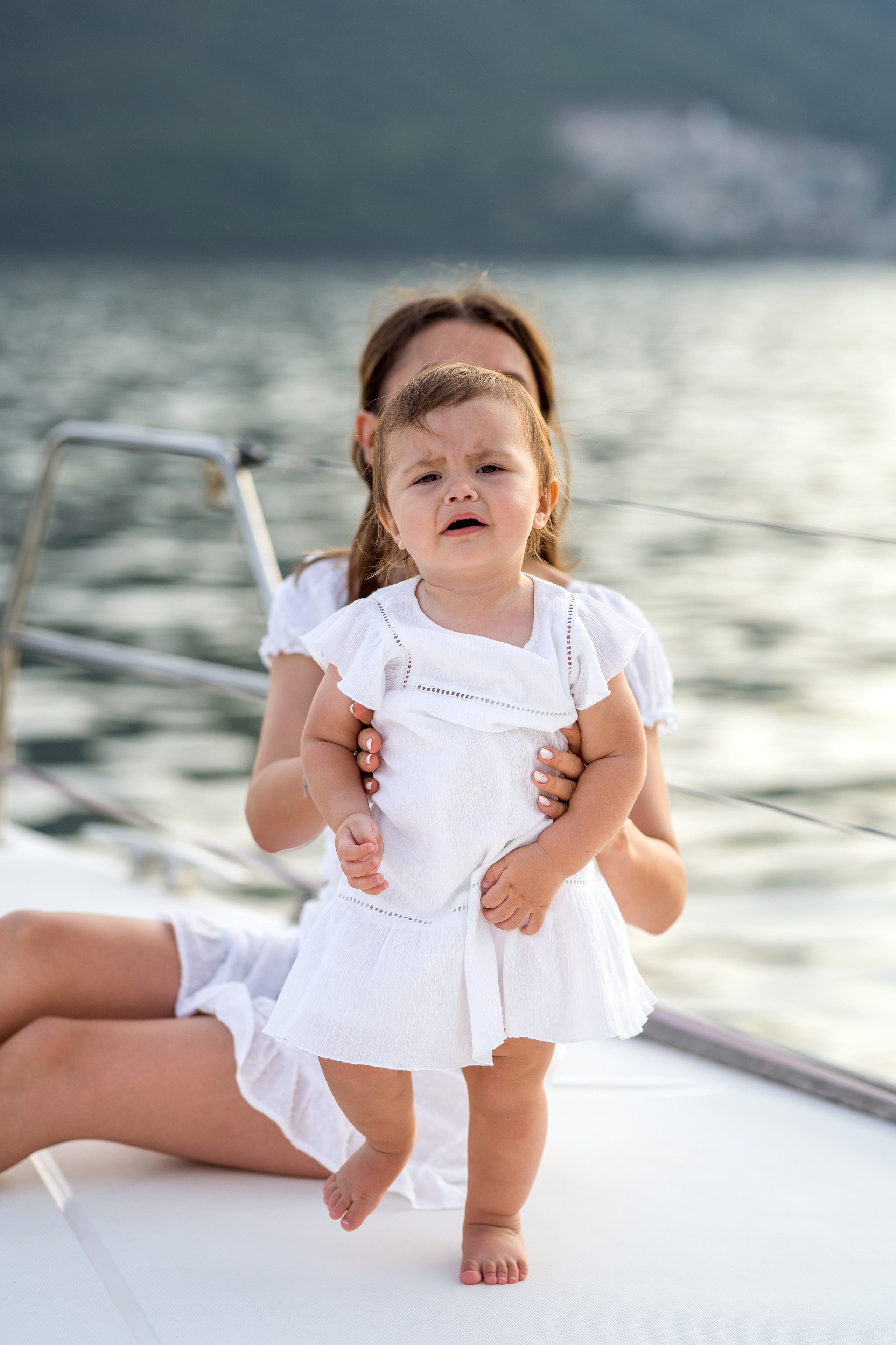 Family photoshoot on a yacht in the Bay of Kotor, Montenegro. Kate Khaldeeva photographer in Saratov