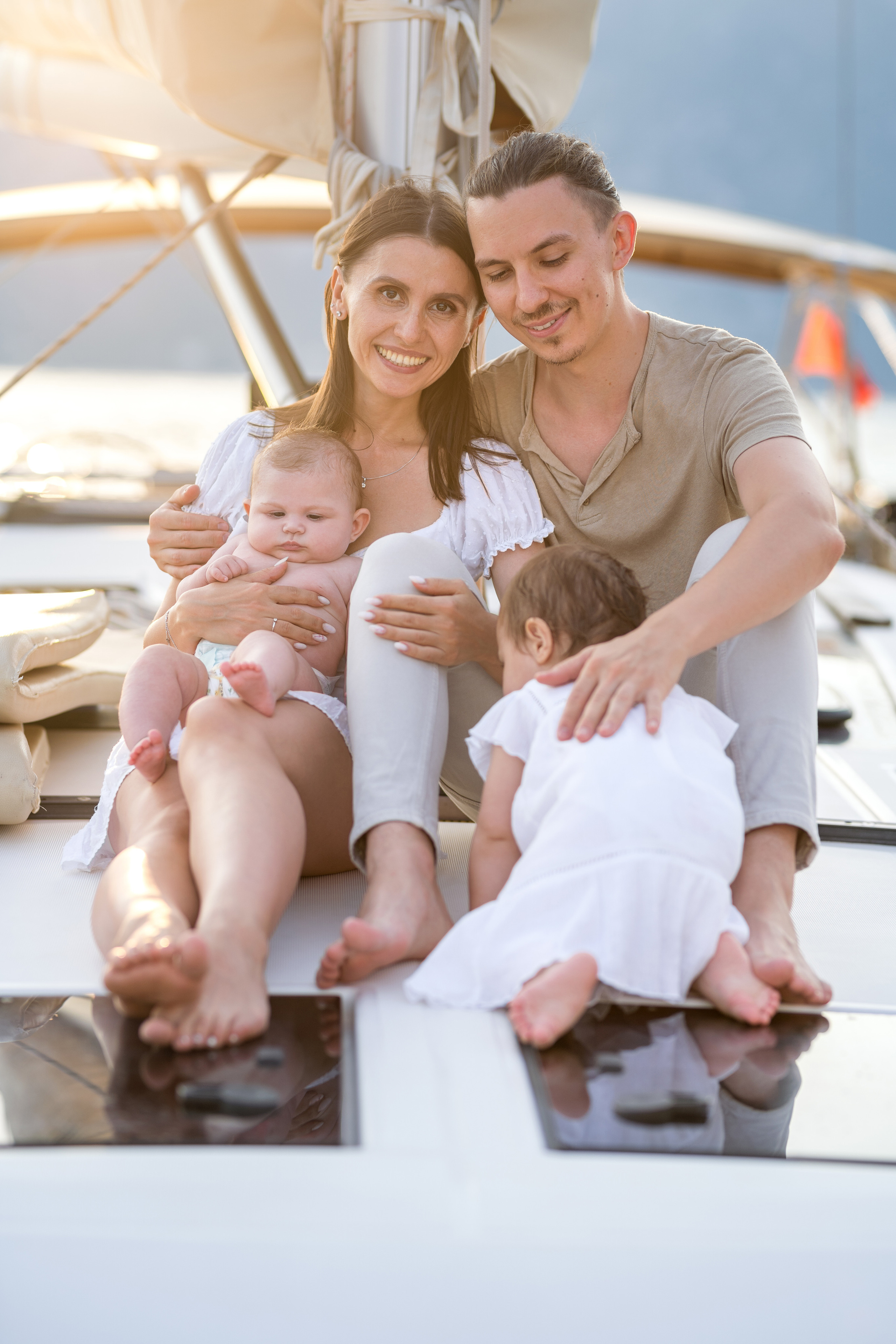 Family photoshoot on a yacht in the Bay of Kotor, Montenegro. Kate Khaldeeva photographer in Saratov