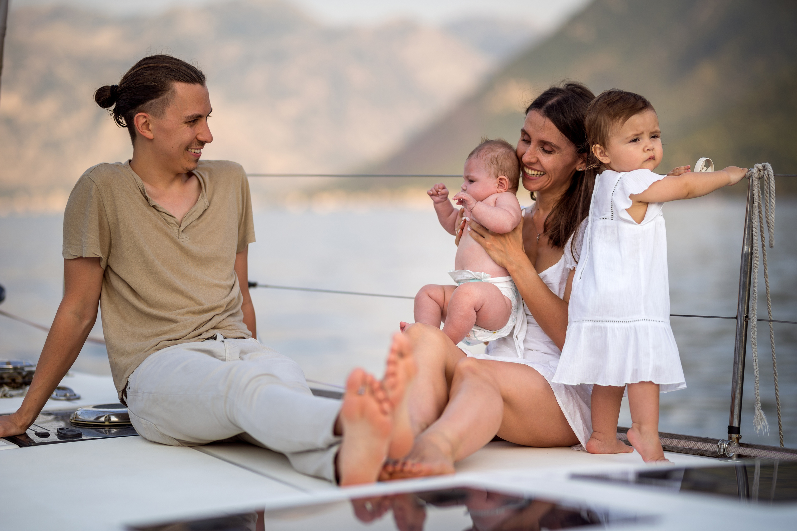 Family photoshoot on a yacht in the Bay of Kotor, Montenegro. Kate Khaldeeva photographer in Saratov