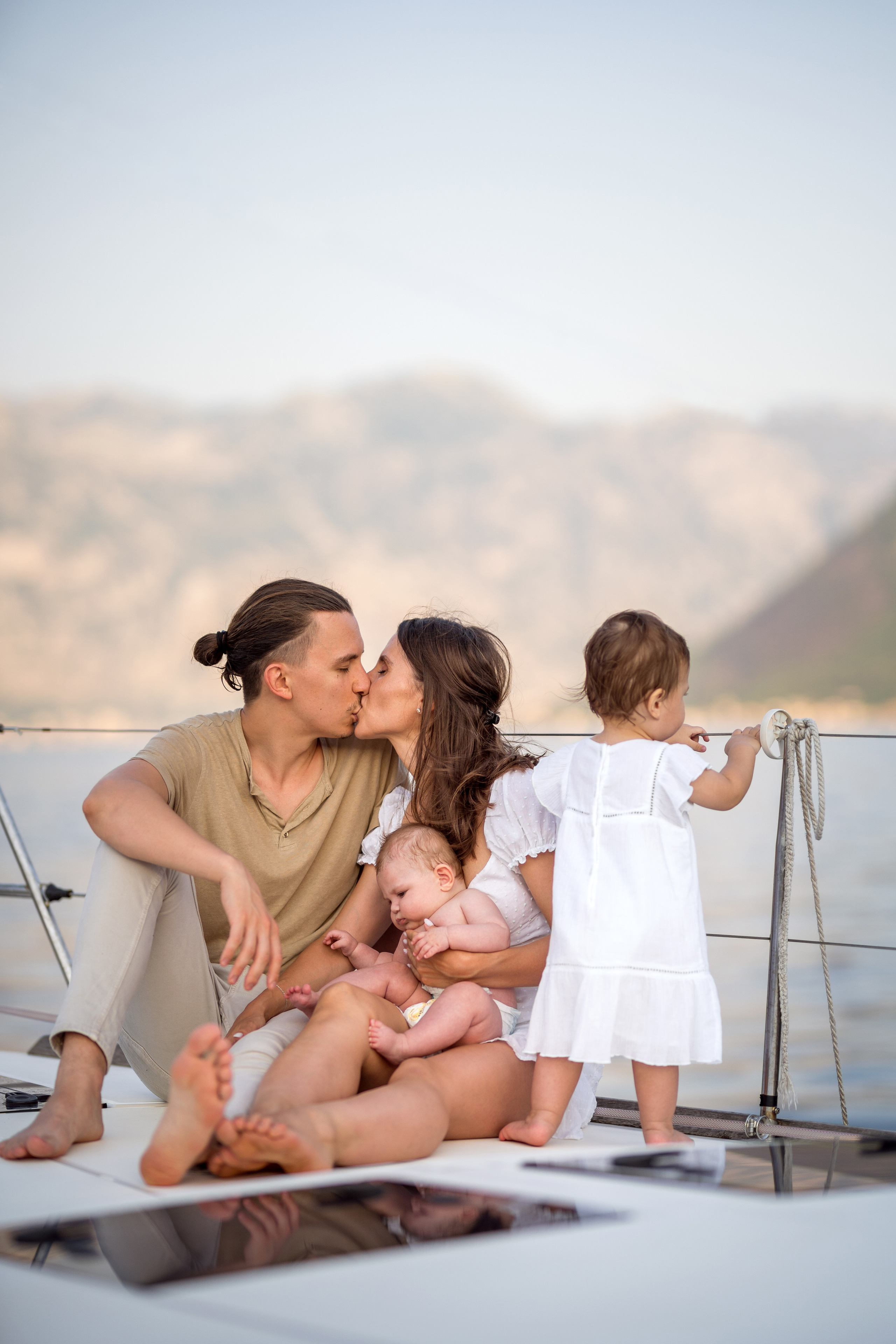 Family photoshoot on a yacht in the Bay of Kotor, Montenegro. Kate Khaldeeva photographer in Saratov