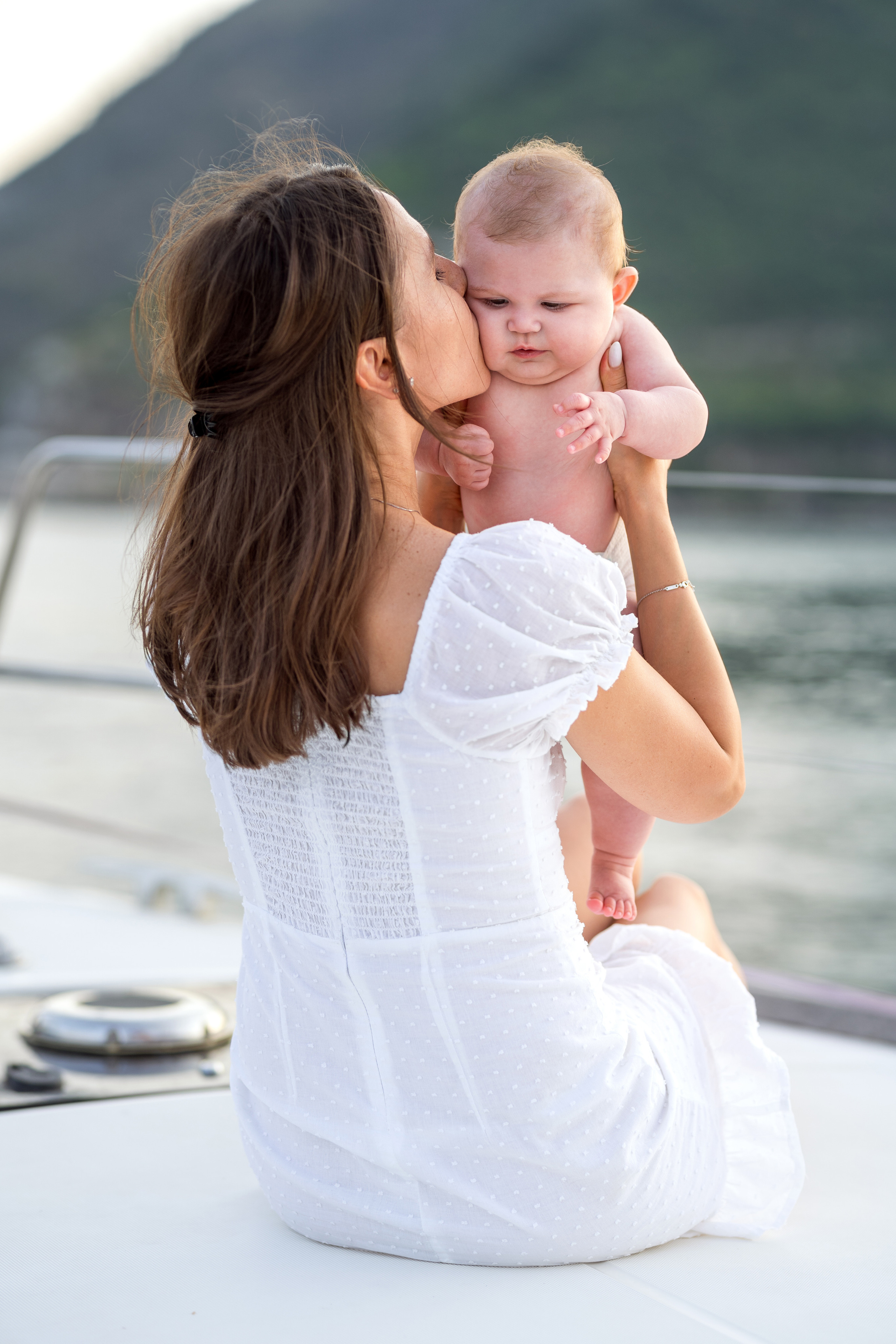 Family photoshoot on a yacht in the Bay of Kotor, Montenegro. Kate Khaldeeva photographer in Saratov