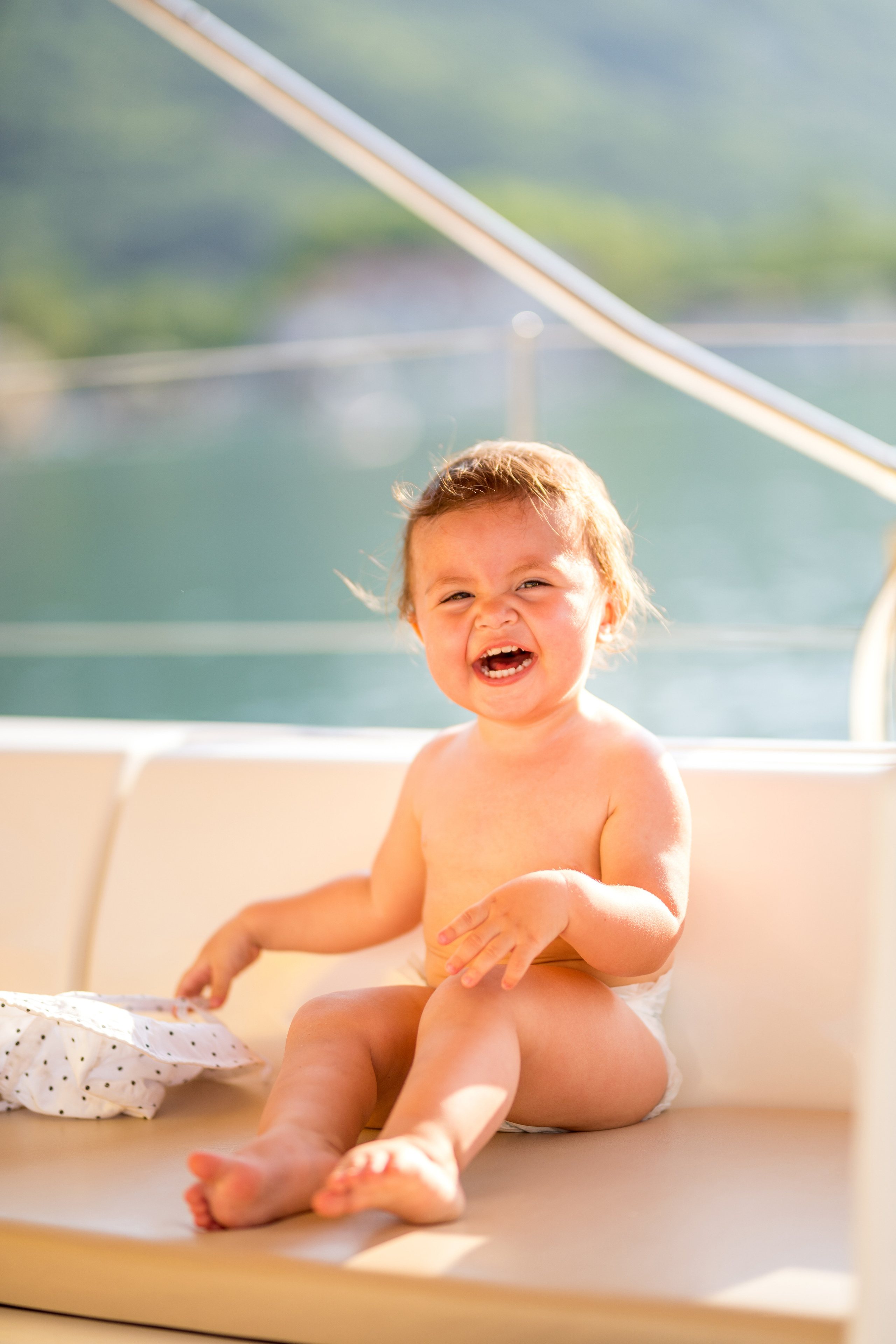Family photoshoot on a yacht in the Bay of Kotor, Montenegro. Kate Khaldeeva photographer in Saratov