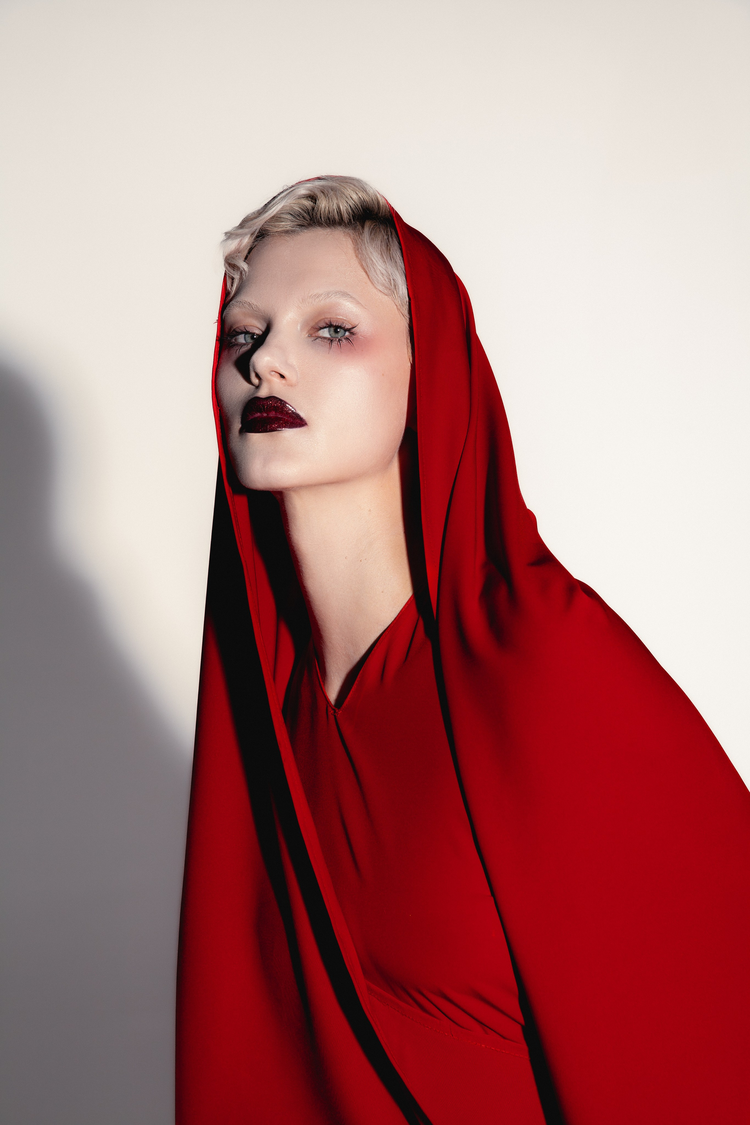 Red. Photographer. Producer. Retoucher