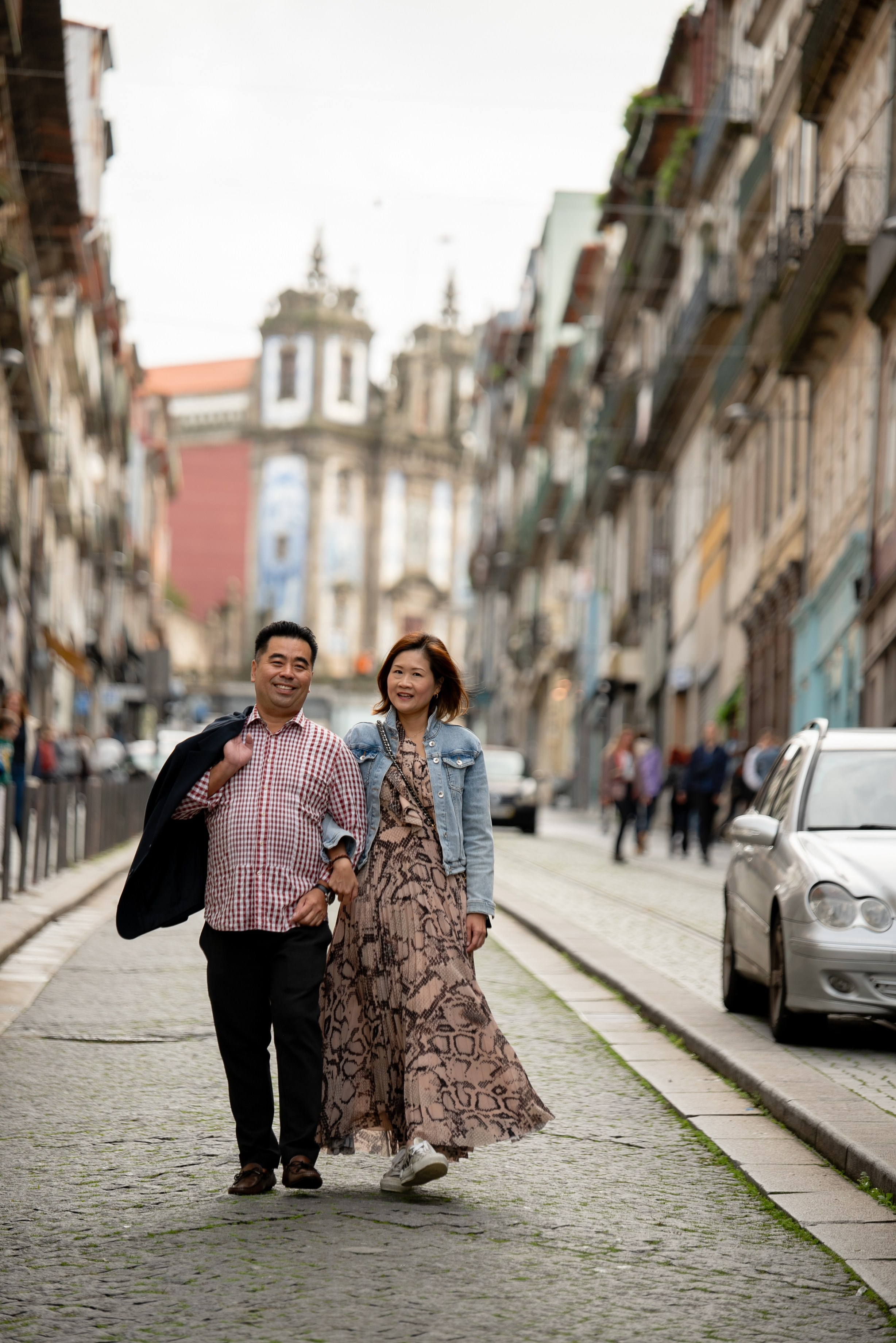 YOKE and ALFRED. Walking in Porto after the rain. Anastasiia Antoniuk portrait, family and couple photographer, Portugal