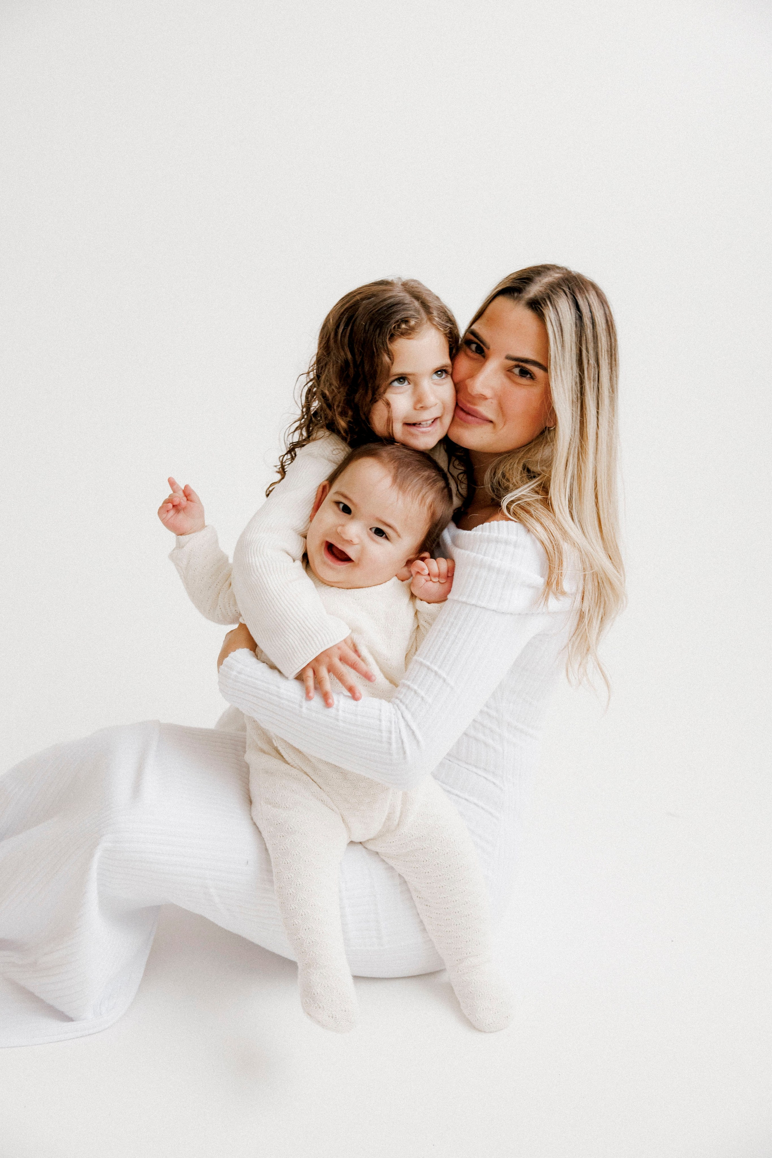 Family photoshoot in White Studio. Wedding and family photographer
