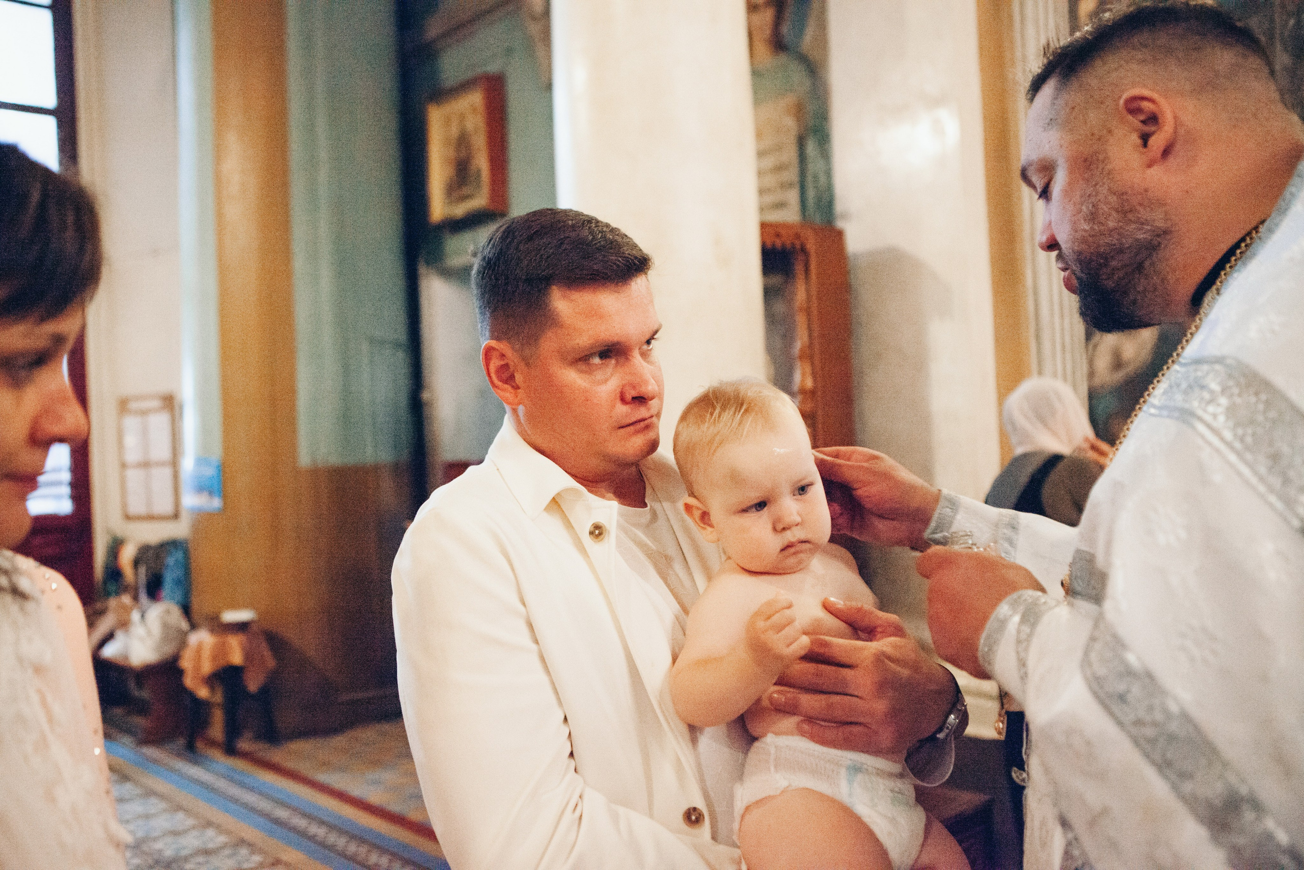Крещение ребенка в церкви. Фотограф Ольга Ефремова
