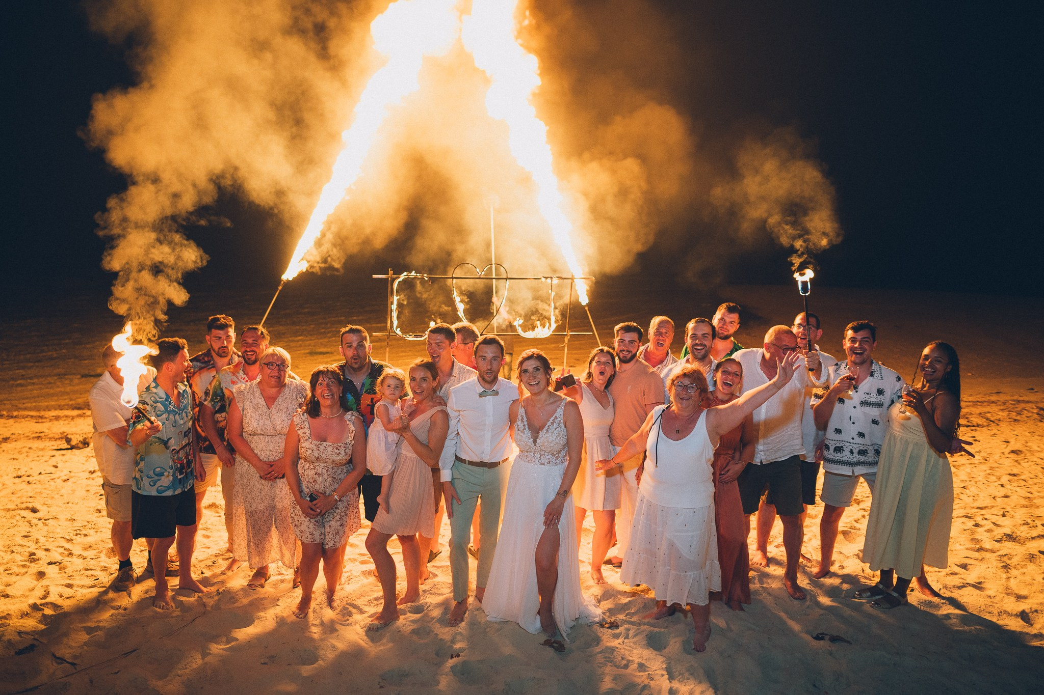 Professional fire dancers performing at a luxury wedding in Thailand