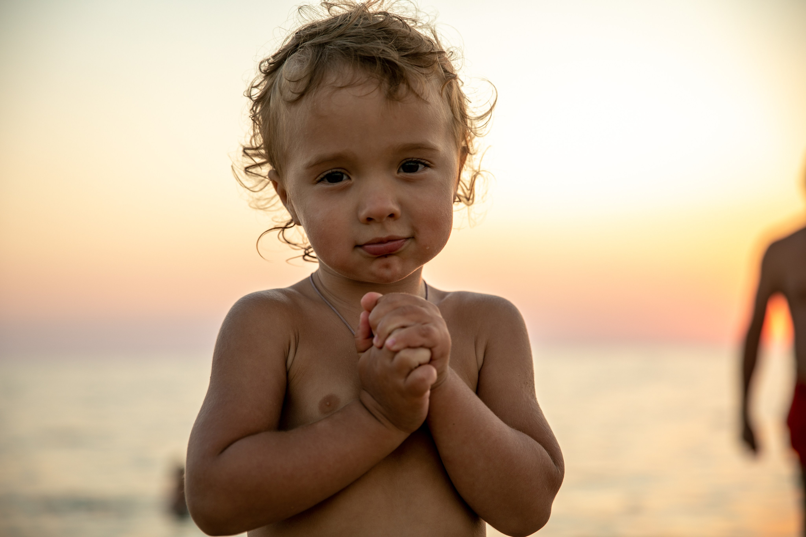 On the sea beach and playground with a little boy