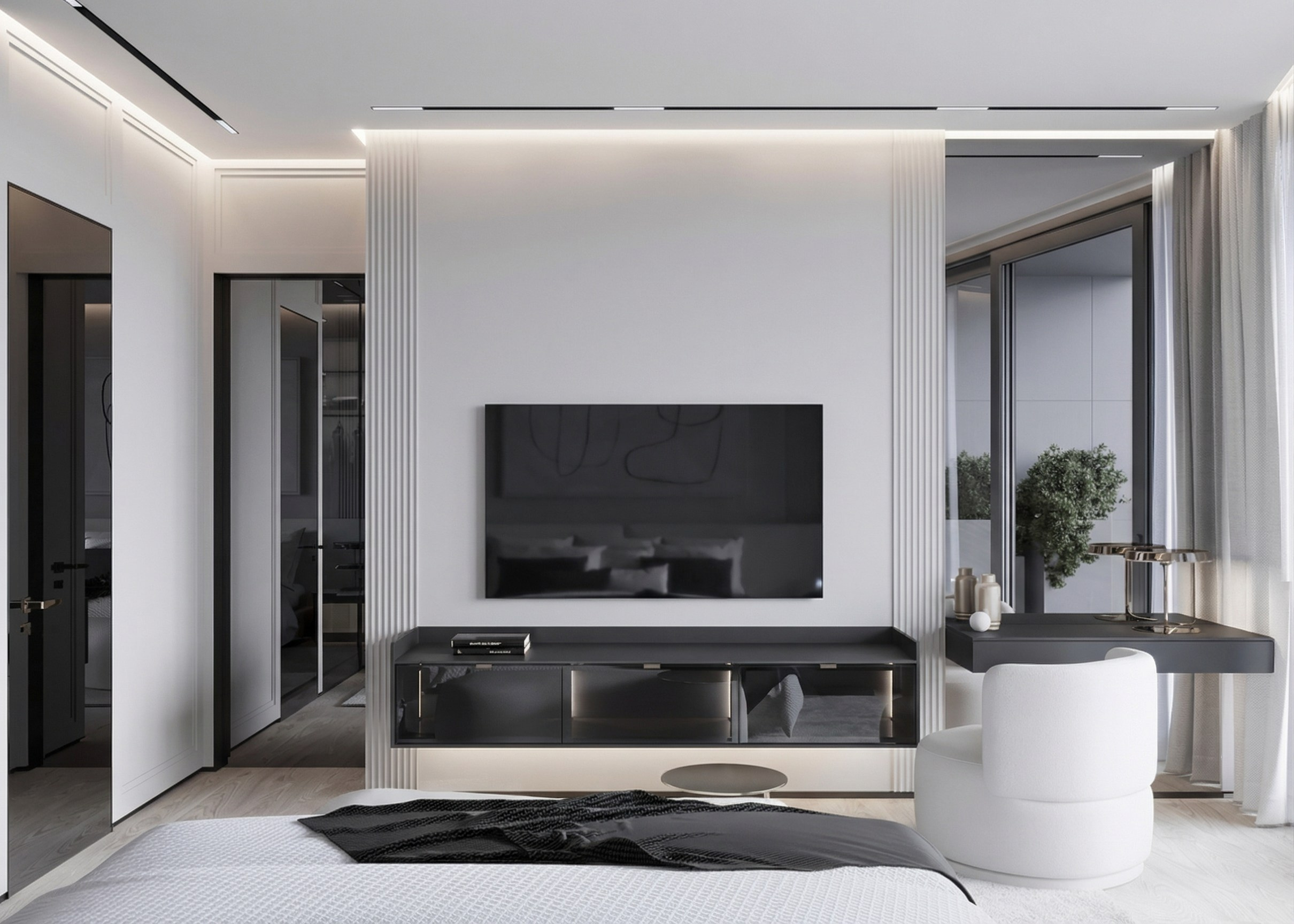 ТВ-зона в спальне квартиры 113 м² от Валерии Котович: белые стеновые панели с канелюрами, подвесная консоль под телевизор, туалетный столик у окна и белое дизайнерское кресло.