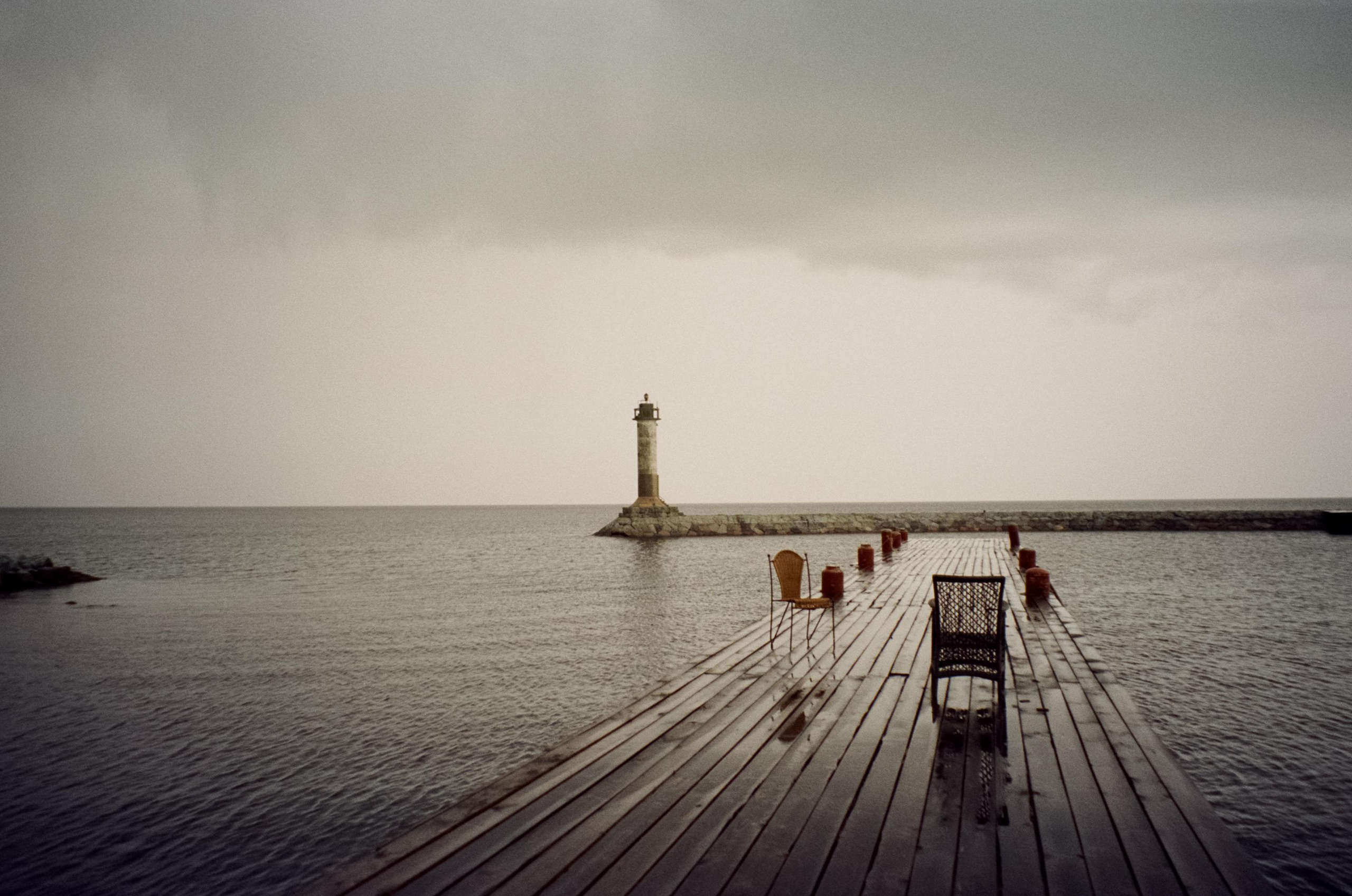 Маяк Вуохенсало в бухте Моторная и закат на озере Отрадное. Фотограф-документалист Мария Осокина